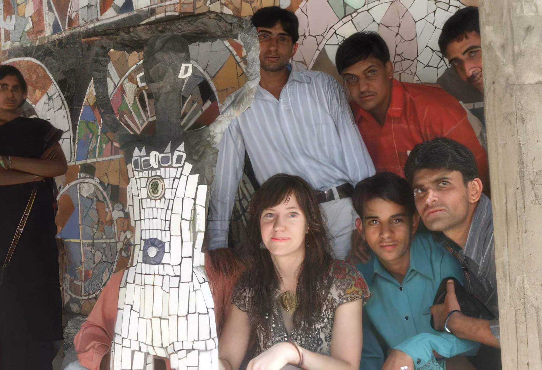 Anne & visitors with sculpture