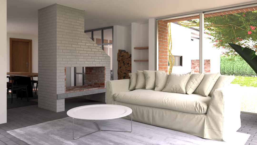 Sala de estar con chimenea de ladrillos blanca, sofá beige con cojines, mesa redonda blanca, y vista al jardín con plantas y flores.