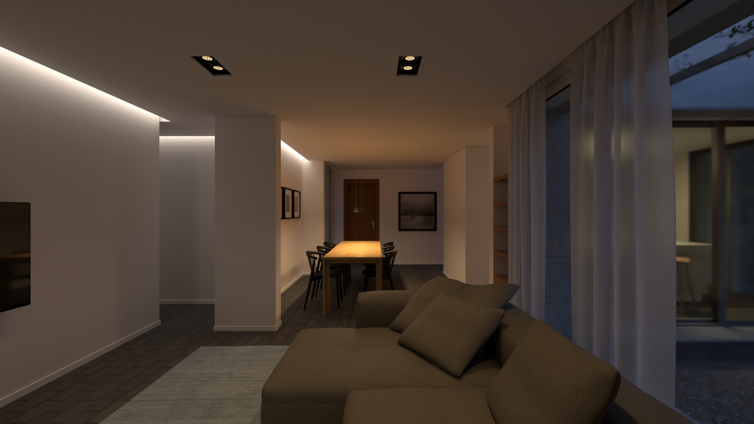 Interior de una sala de estar y comedor con luz cálida, sillones beige, mesa de madera y cortinas blancas, vista a un balcón o terraza en la noche.