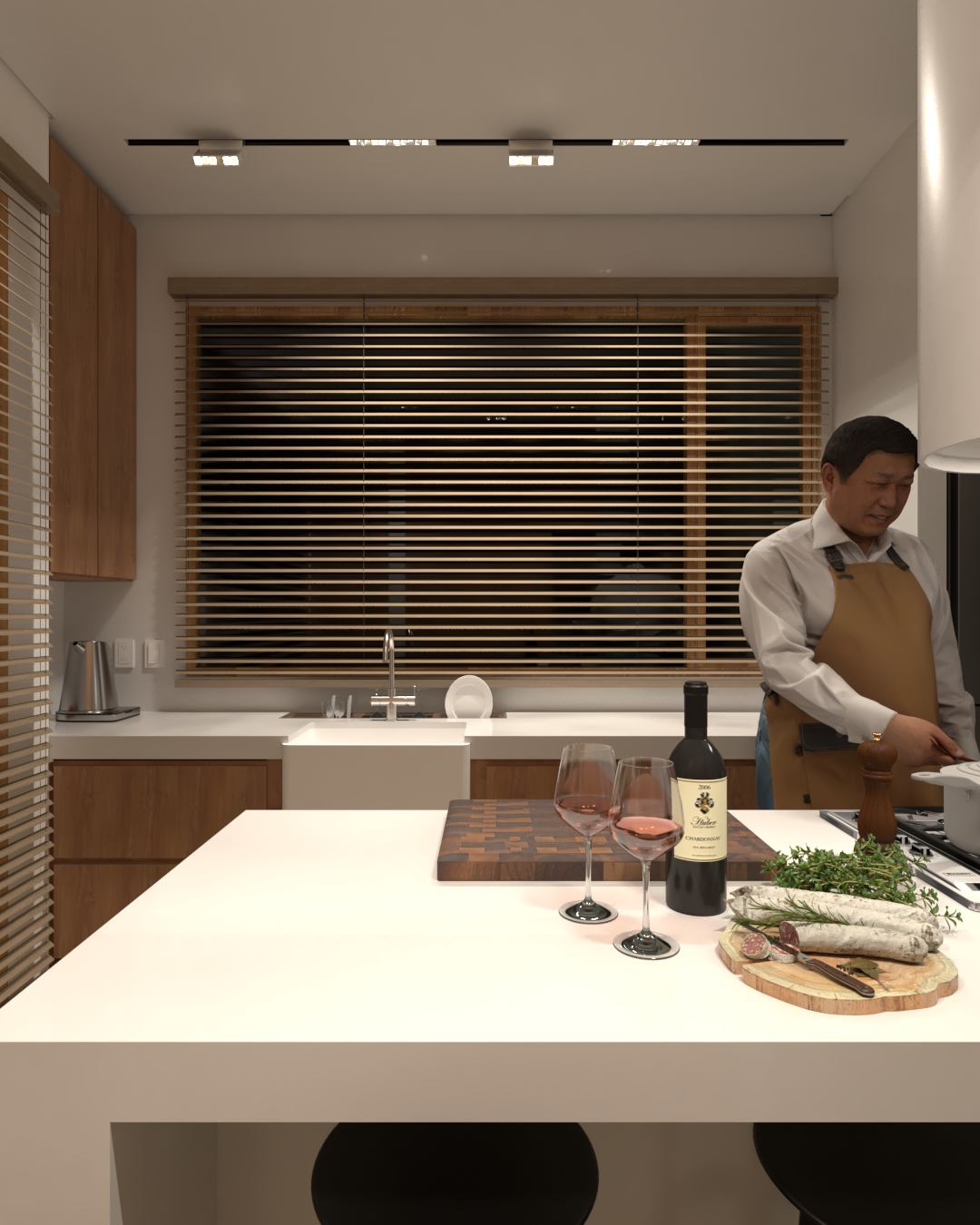 Hombre cocinando en una cocina moderna, con vino rosado, pescado, hierbas y utensilios de cocina sobre la mesa.