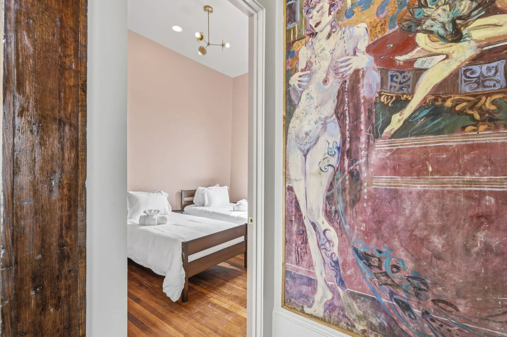Hallway mural and view of Madam's Chamber in the Mollie Walters House