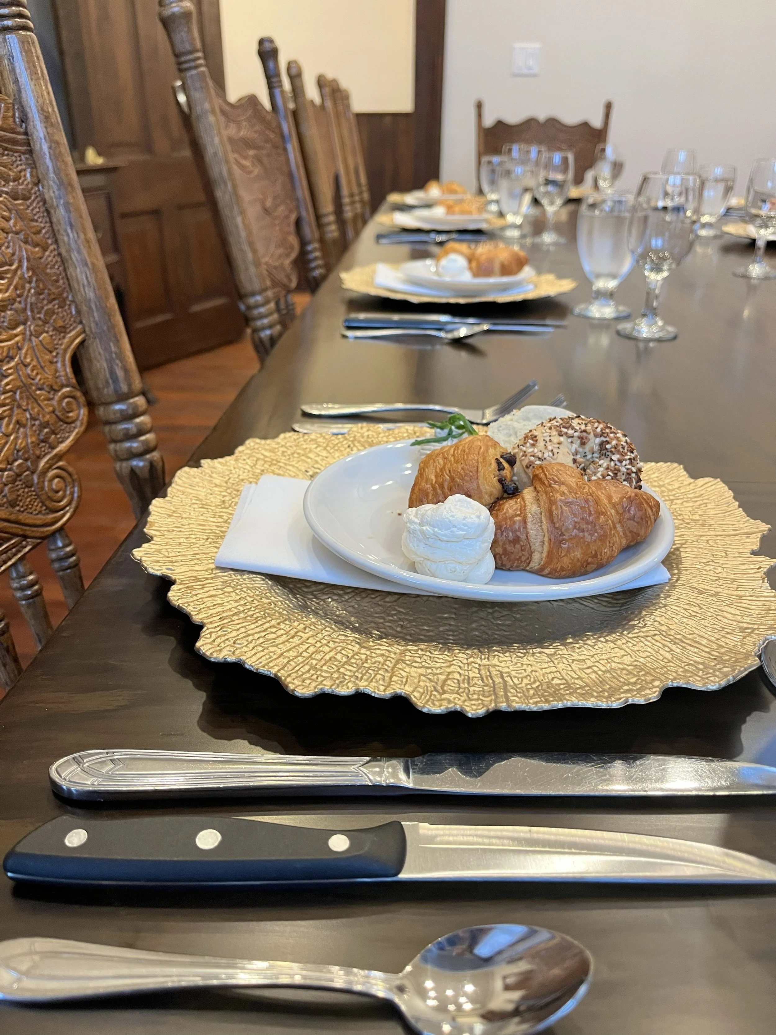 A table set by catering in the Mollie Walters House Kitchen