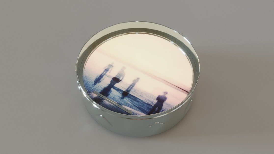 Combining all the elements of the core memory that the biscuit tin
symbolises, Maddy generates images from the users digital photo
archive randomly once opened. The user has no control over what is
going to appear.