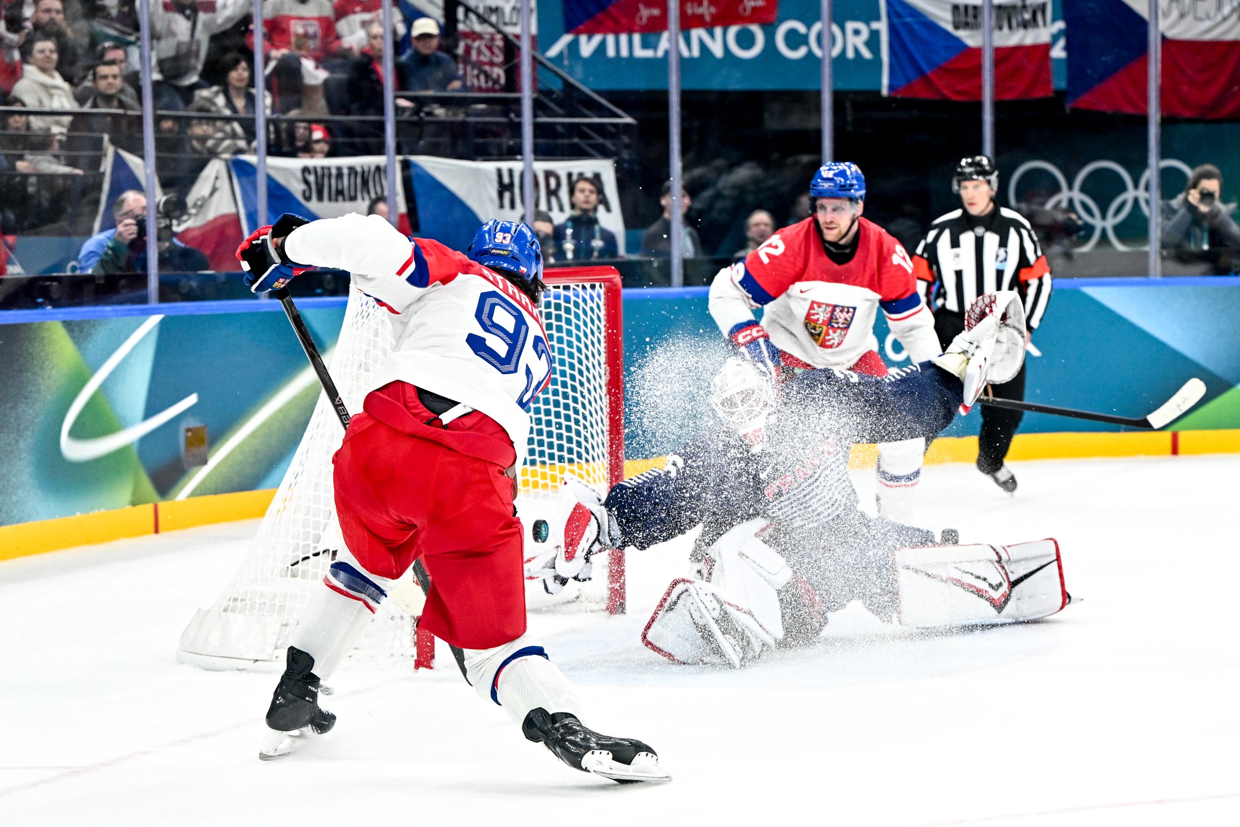  Matej Stránský scores a goal as the opposing goaltender is engulfed in a cloud of snow 