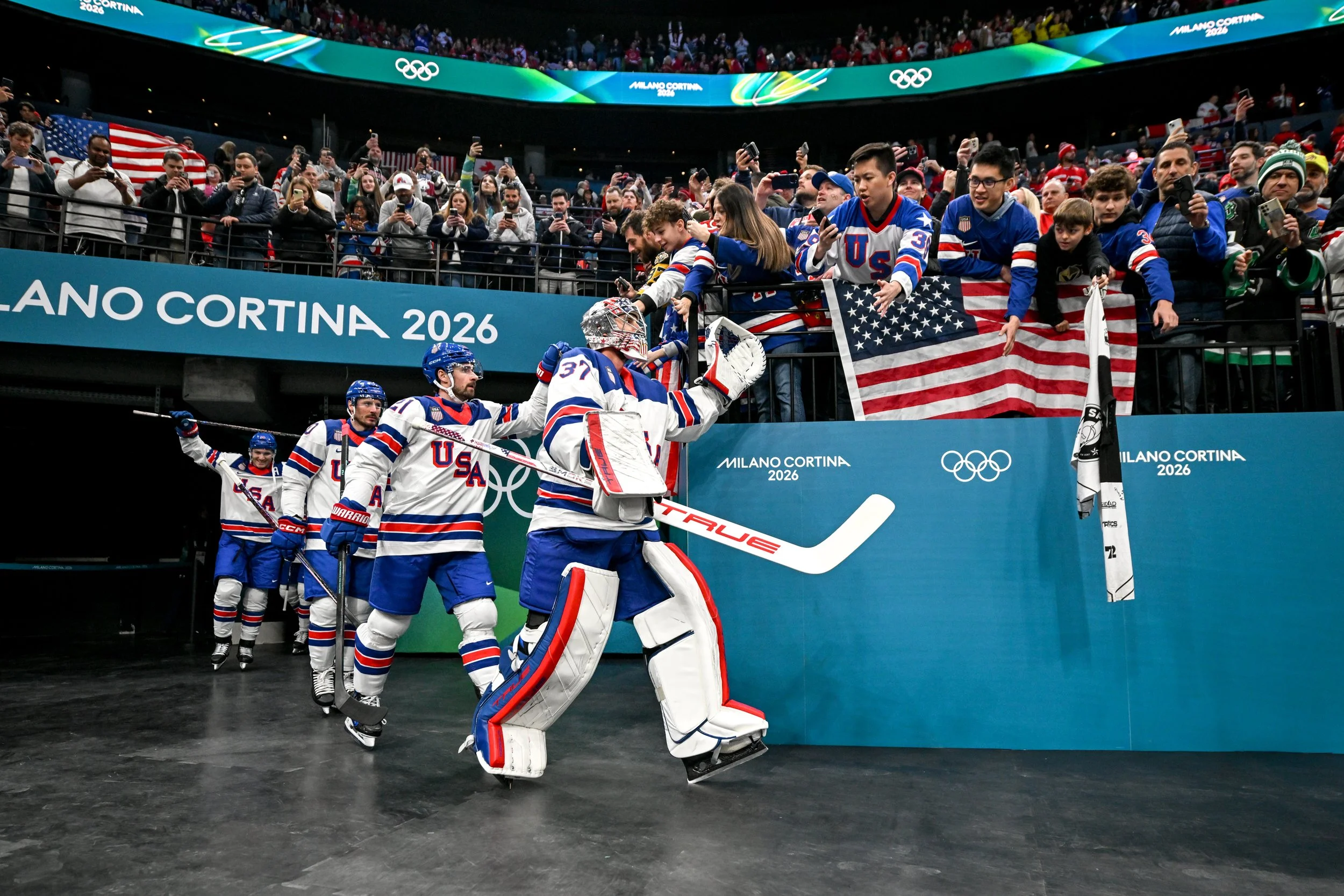  The United States are welcomed onto the ice by their fans 