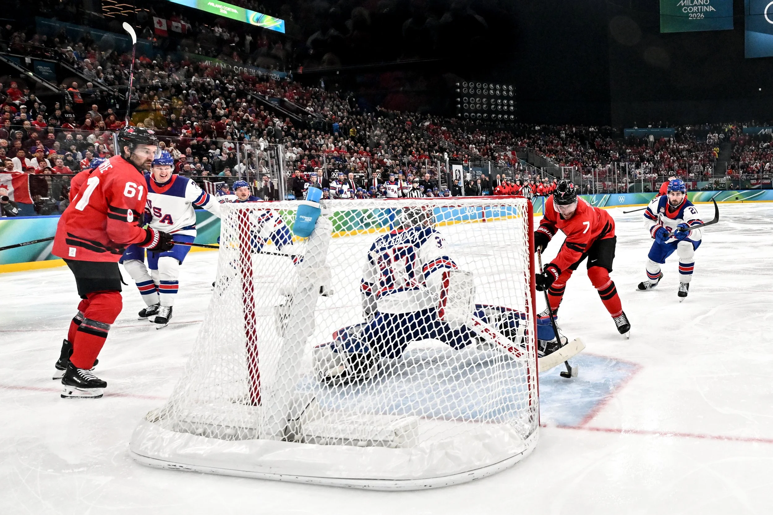  Connor Hellebuyck makes a decisive save against Devon Toews in the Olympic final 