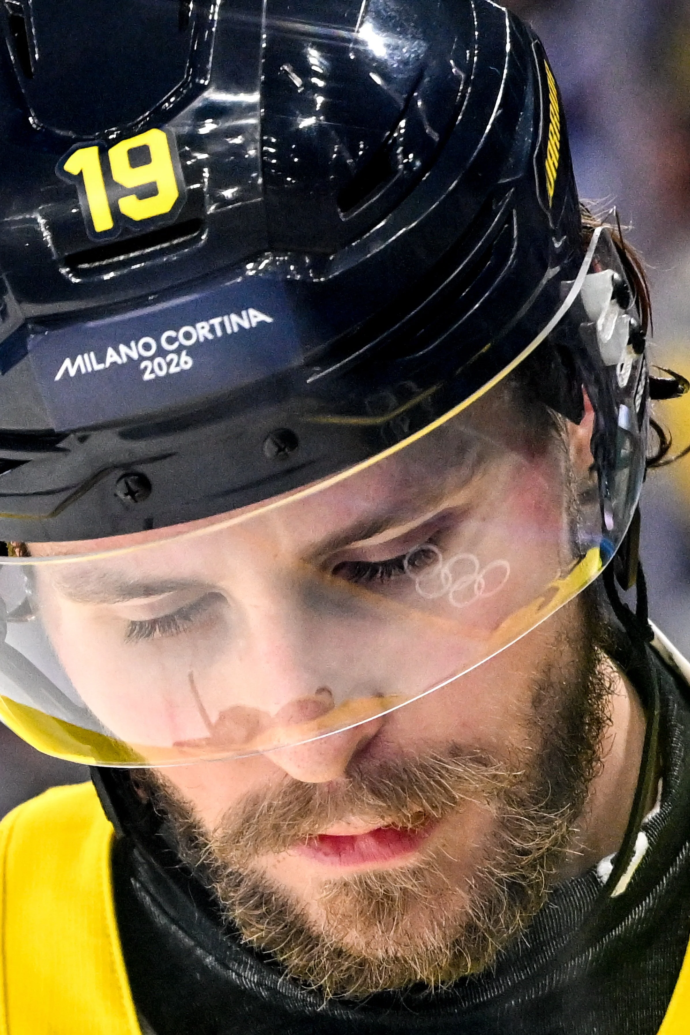  The Olympic rings reflected in Adrian Kempe’s visor 