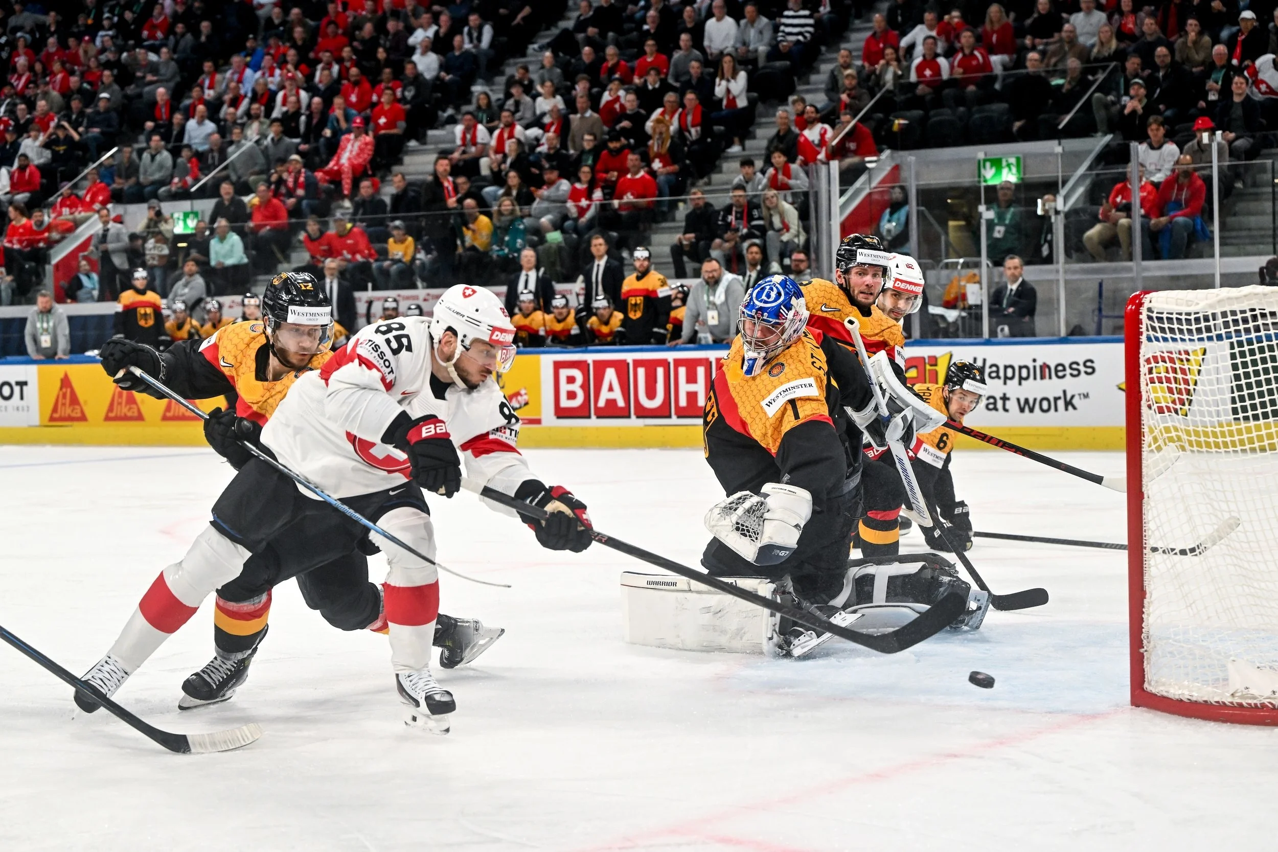  Sven Andrighetto scores with a backhand shot against Germany 