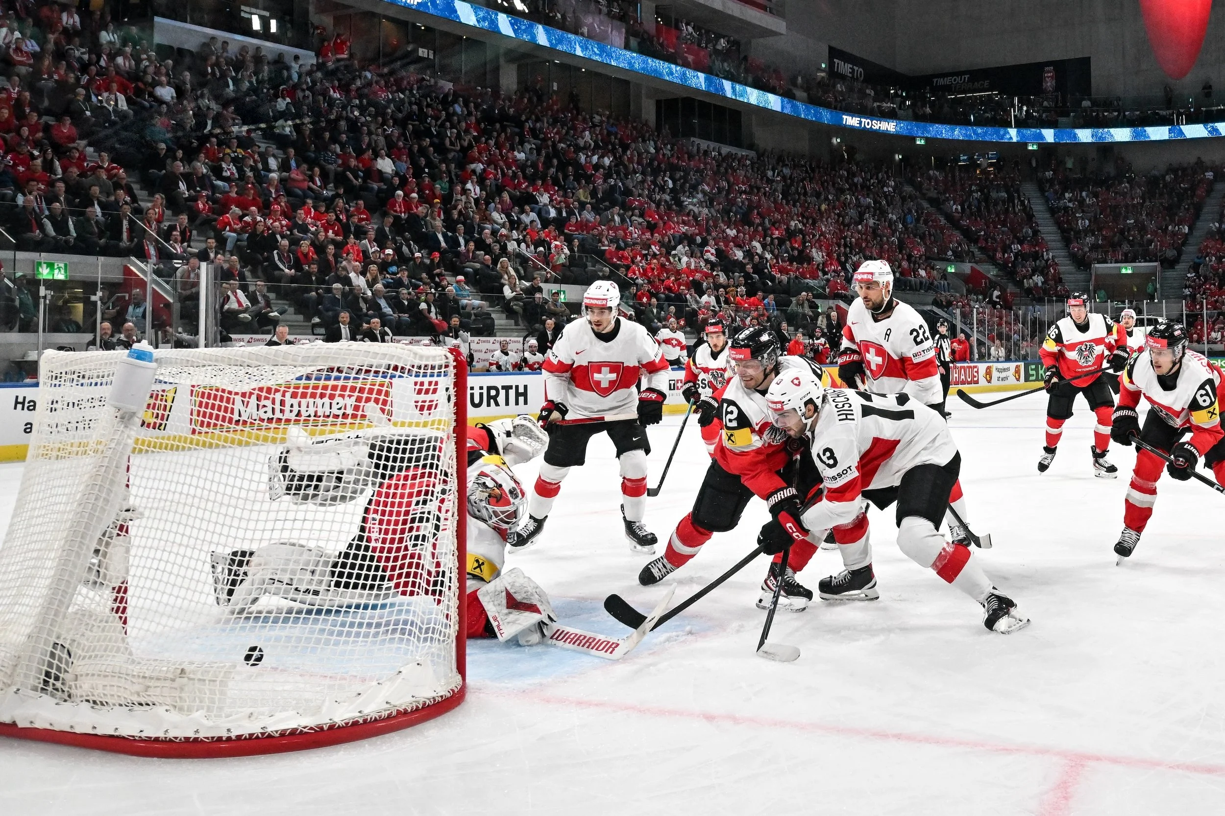  Nico Hischier beats Austria’s goaltender 