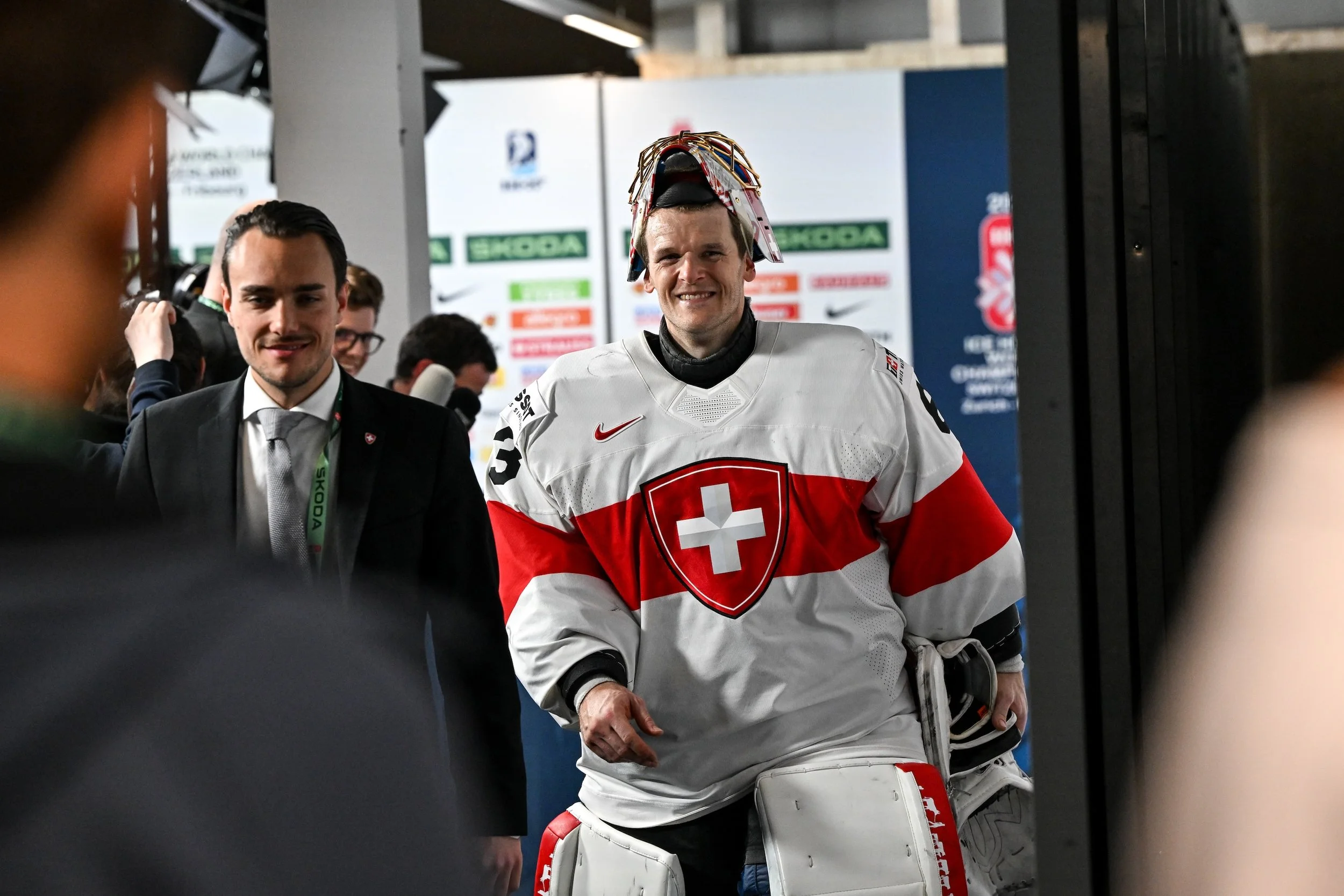  Goaltender Leonardo Genoni smiles as he meets the media after breaking the all-time shutout record at the IIHF World Championship 