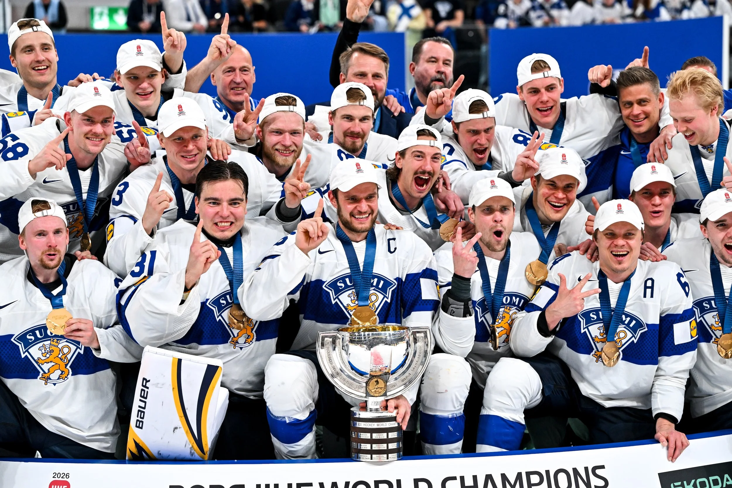  The Finnish players pose with the World Championship trophy 