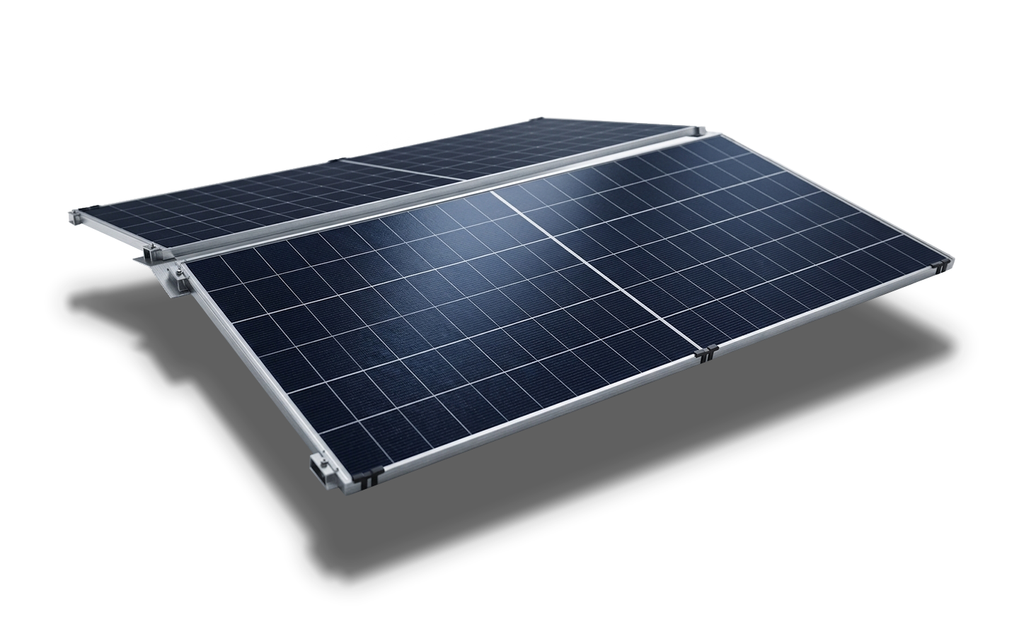 Two large solar panels lying flat on a black surface