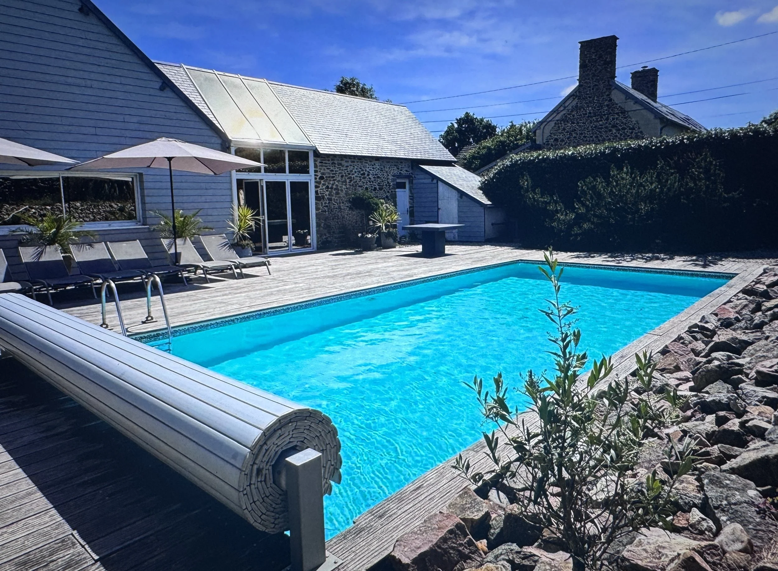 Family-friendly pool area at La Brocanterie