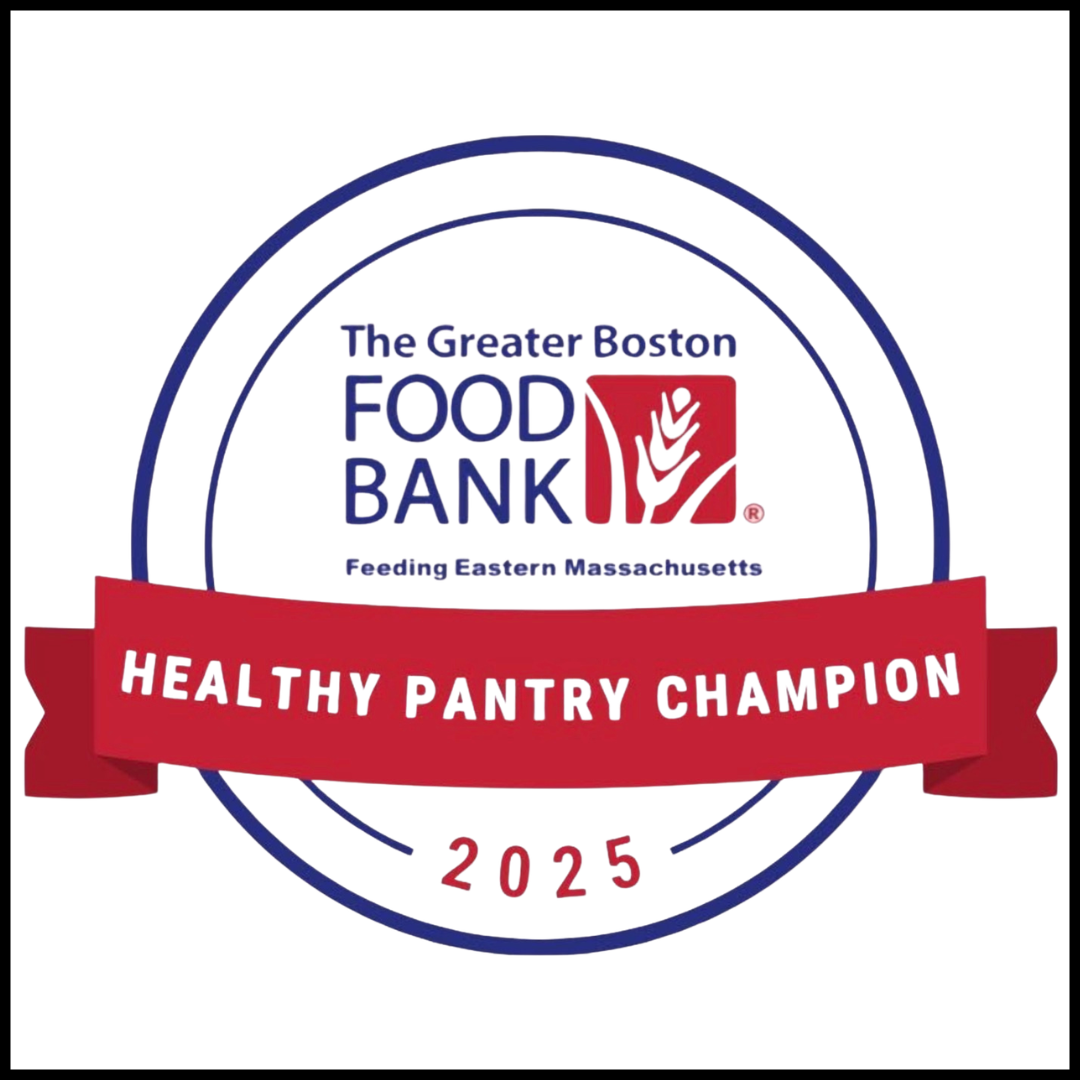 Badge from The Greater Boston Food Bank recognizing a Healthy Pantry Champion for 2025.