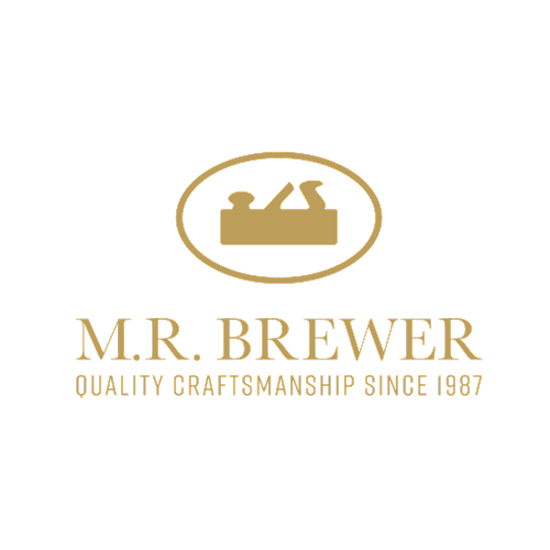Logo of M.R. Brewer with a wood planing tool and the text "M.R. Brewer Quality Craftsmanship Since 1987" in gold color.