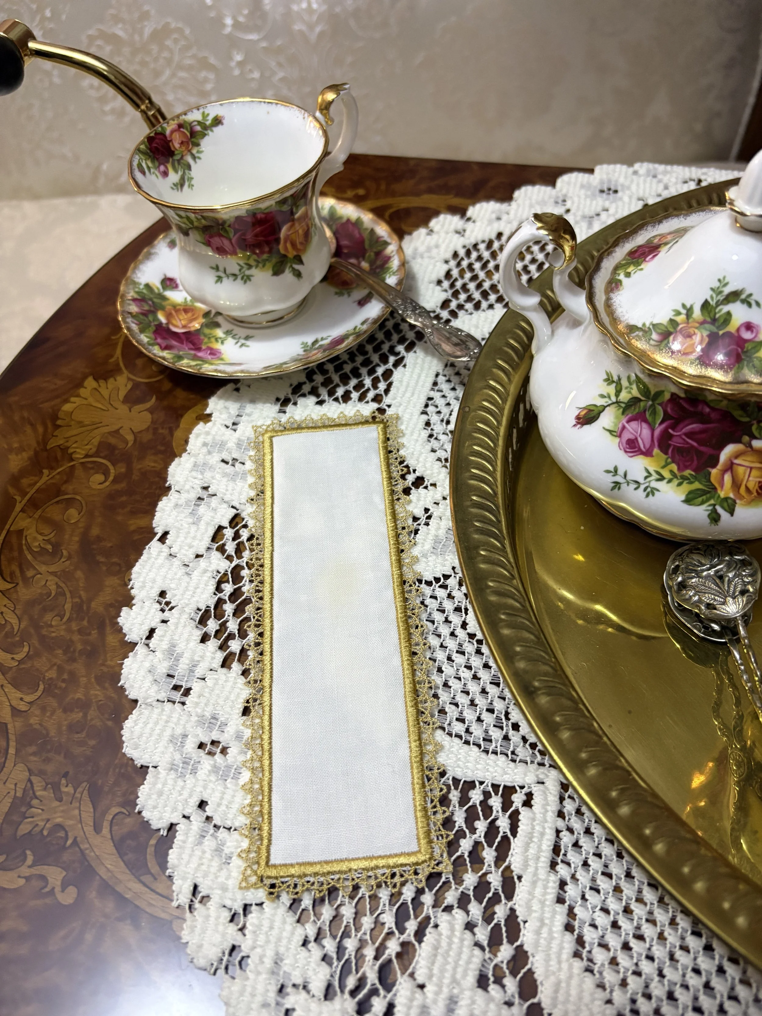 Golden Heirloom Lace Bookmark tea service.jpeg