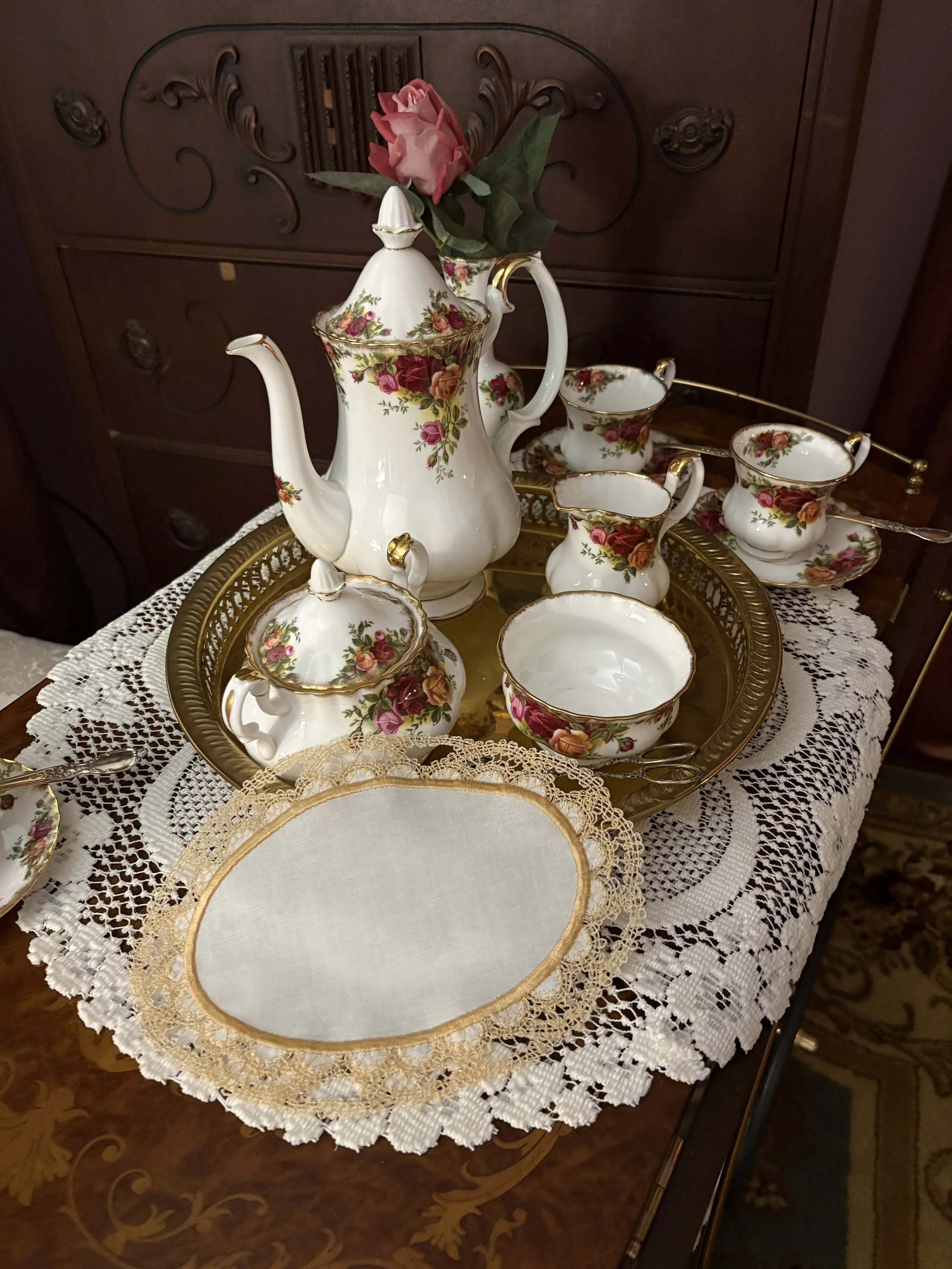 Rosewood Parlor Lace Mat tea service.jpeg