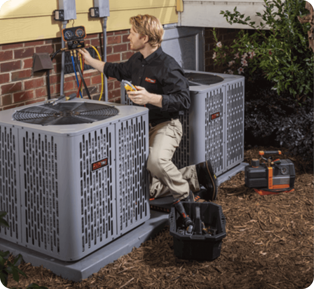 A technician working on an HVAC system, inspecting and testing the outdoor air conditioning units with various tools in a backyard.