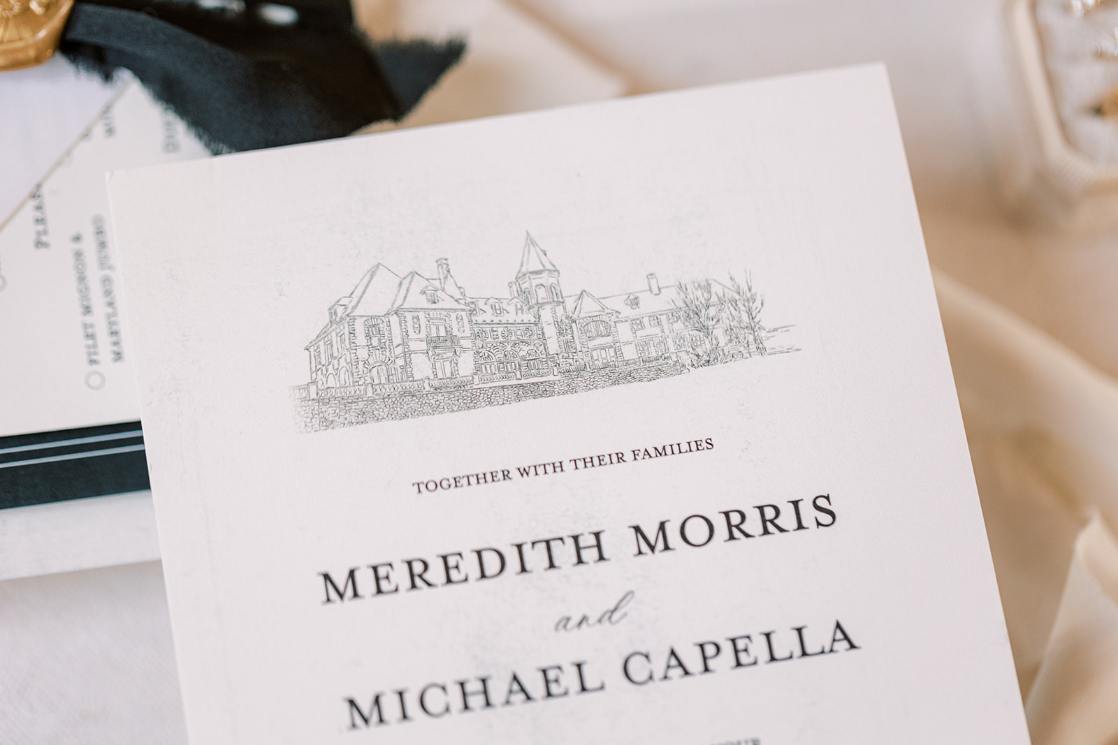 Wedding invitation with an illustration of a large historic building, with text reading "Together with their families, Meredith Morris and Michael Capella".