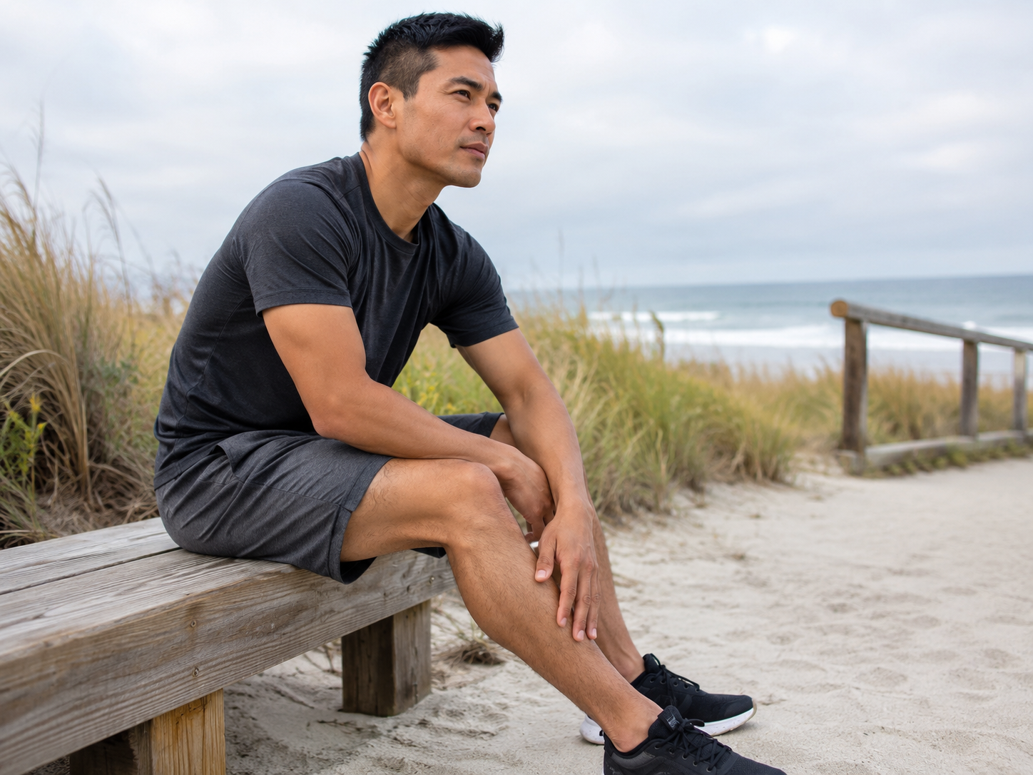 Man resting on a bench beside the beach in Wilmington, NC, representing recovery, joint support and inflammation support with BPC-157 therapy.