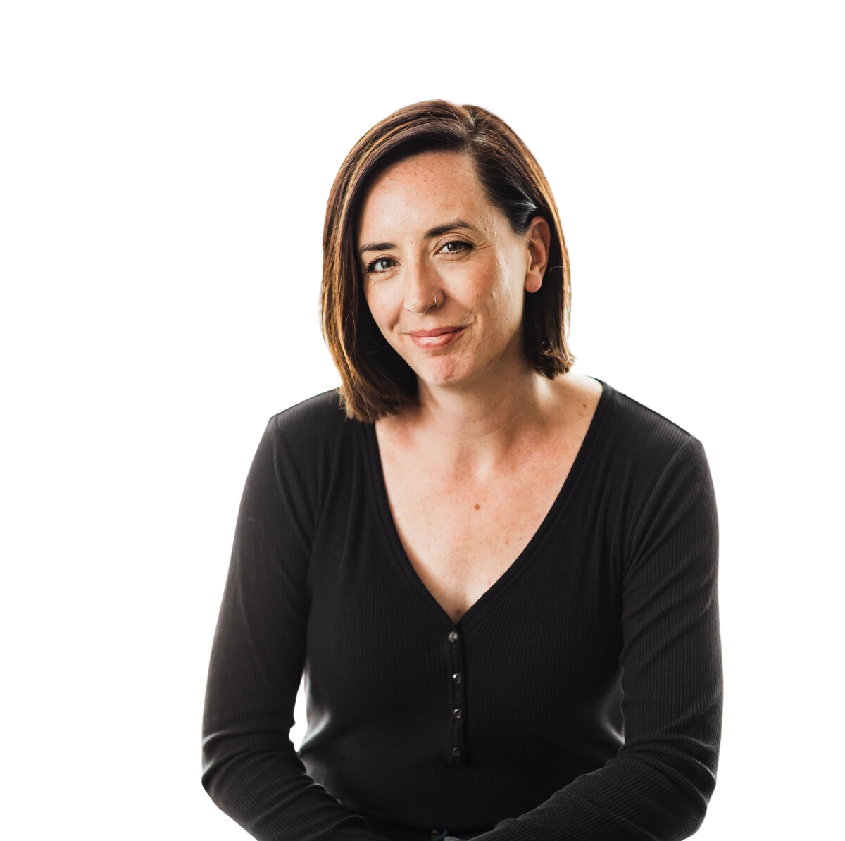 A woman with shoulder-length brown hair, wearing a black top, is smiling slightly and looking at the camera.