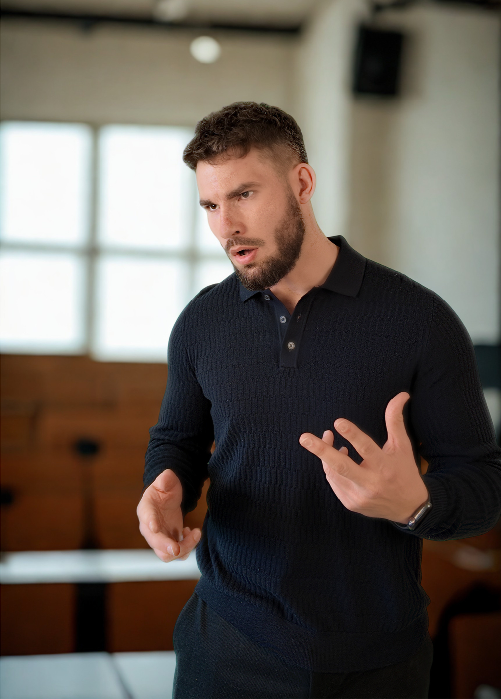 Tommy Graves speaking at a corporate wellbeing event