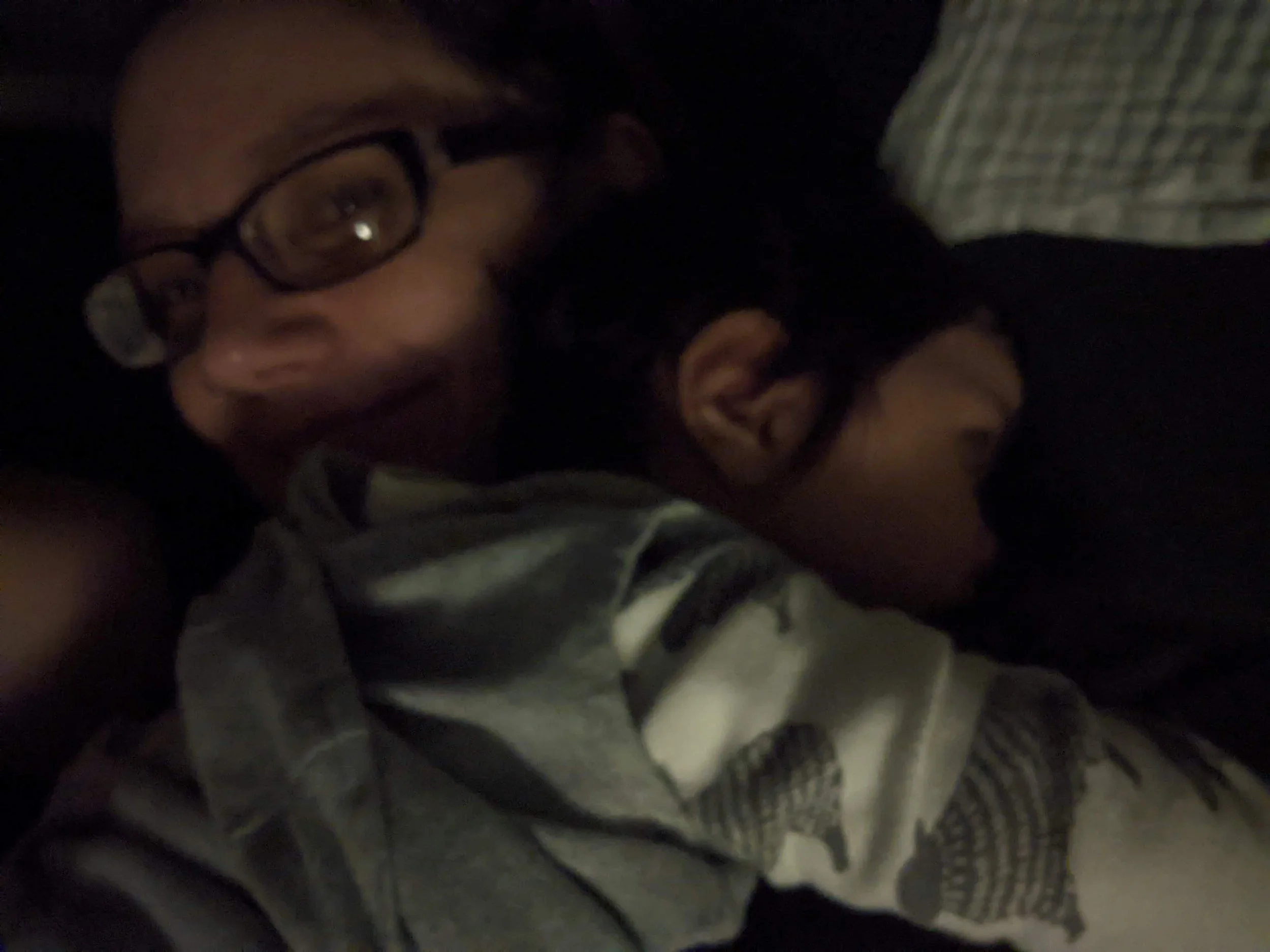 Overnight postpartum doula caring for a newborn while parents sleep