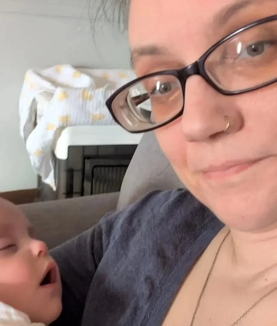 Postpartum doula supporting a new parent and baby in the St. Louis Metro East area