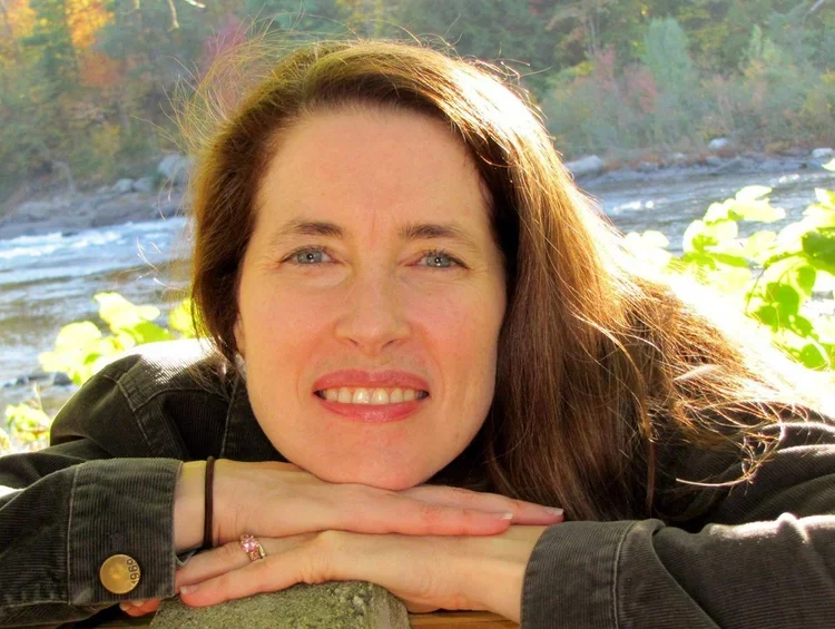 Denise, founder of Reiki & Restore, offering Reiki and holistic wellness services in Saratoga Springs, NY.