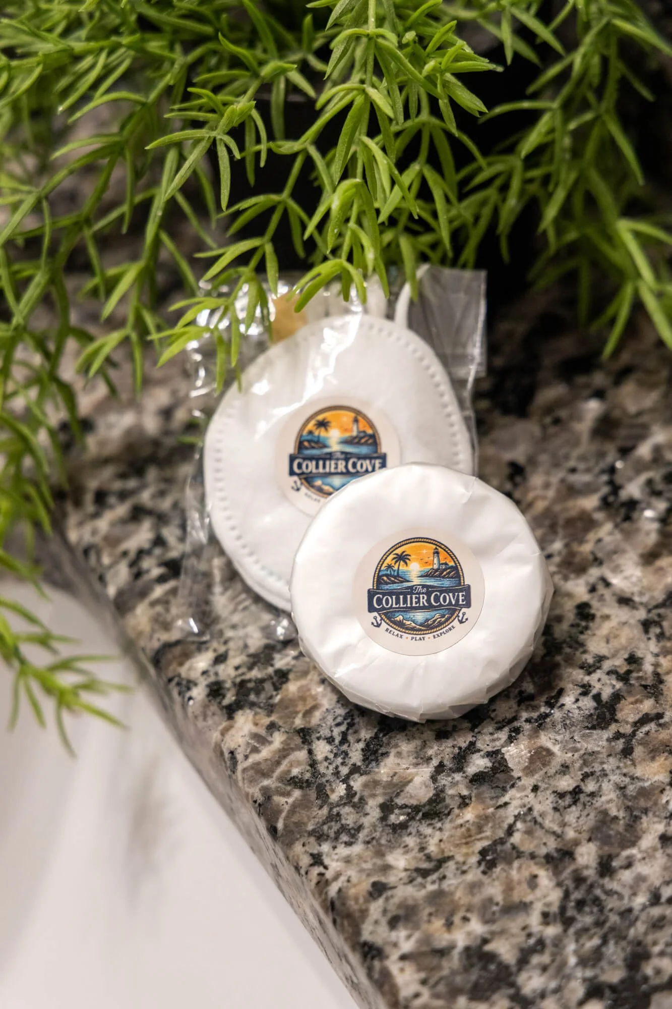 Collier Cove branded bath amenities on the vanity