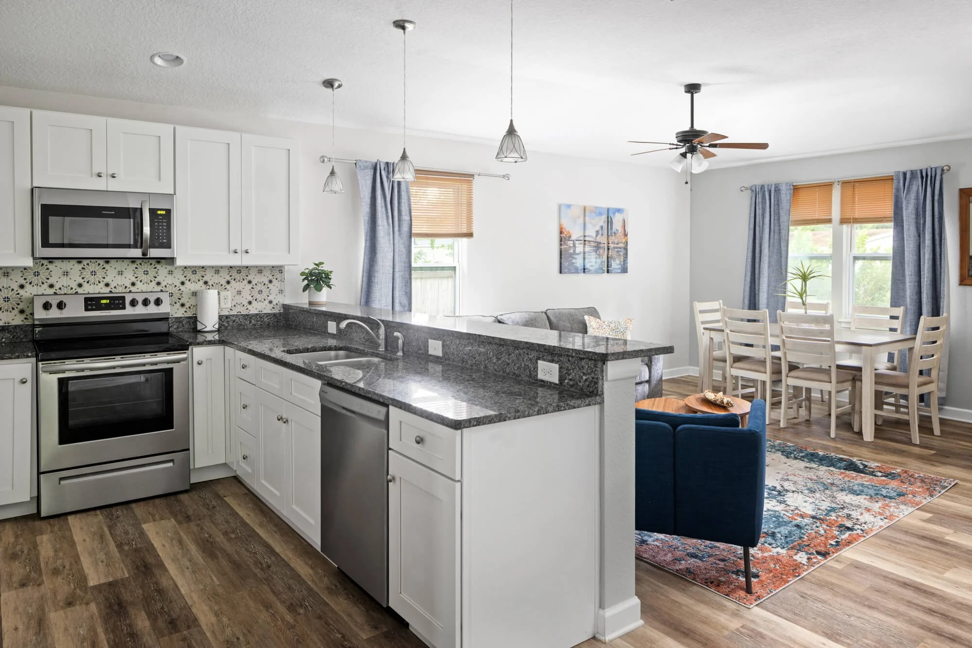 Kitchen opening to the living and dining space