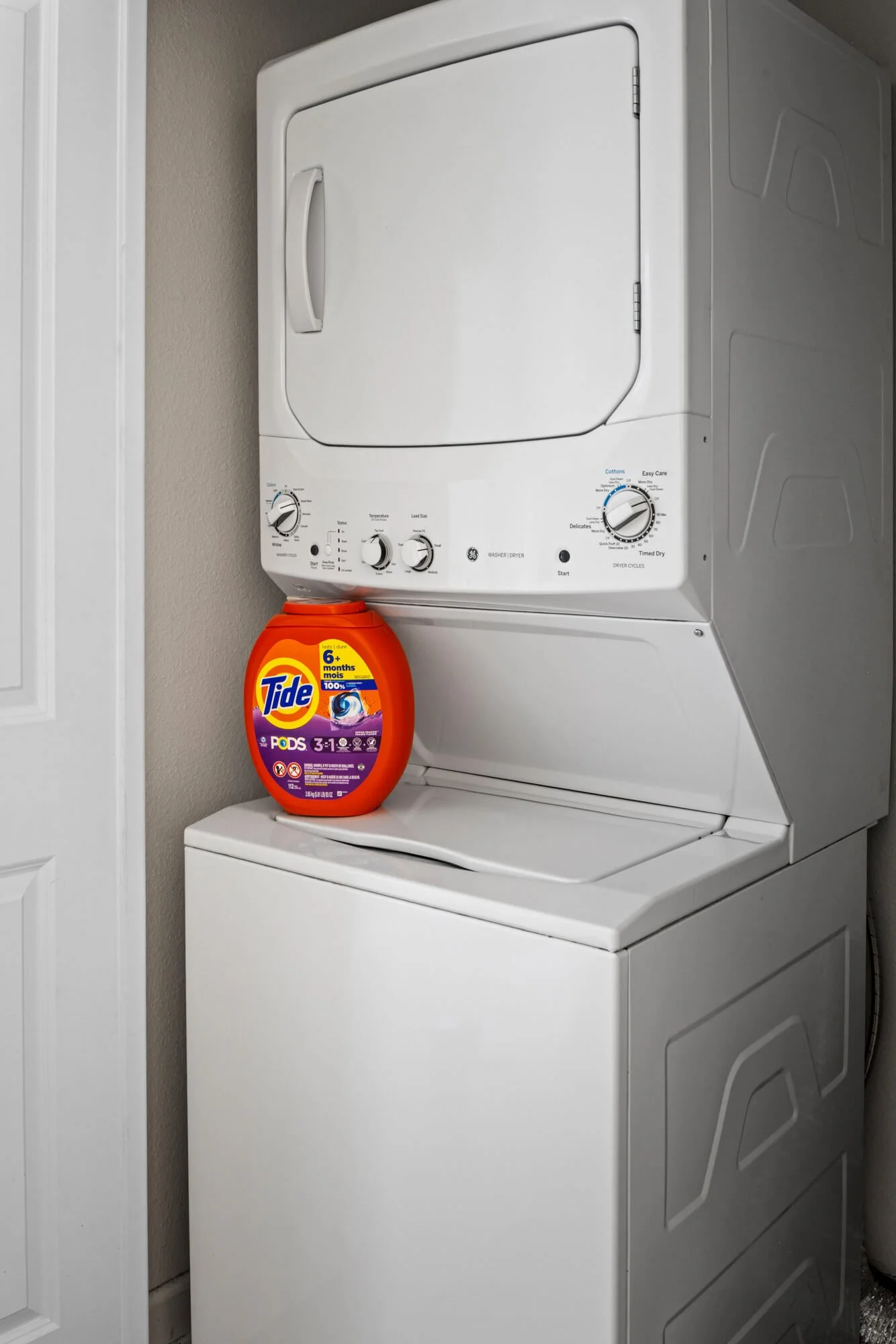In-unit stacked washer and dryer