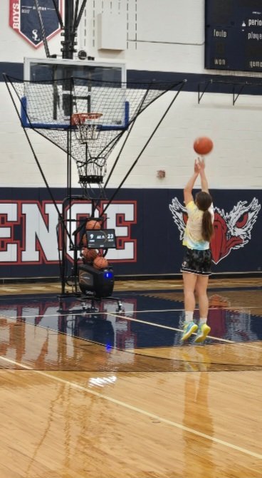 Basketball shooting machine