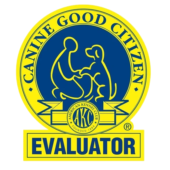 A logo for Canine Good Citizen evaluation by the American Kennel Club, featuring a circular emblem with a dog and person shaking hands, and the words "Canine Good Citizen" and "Evaluator".