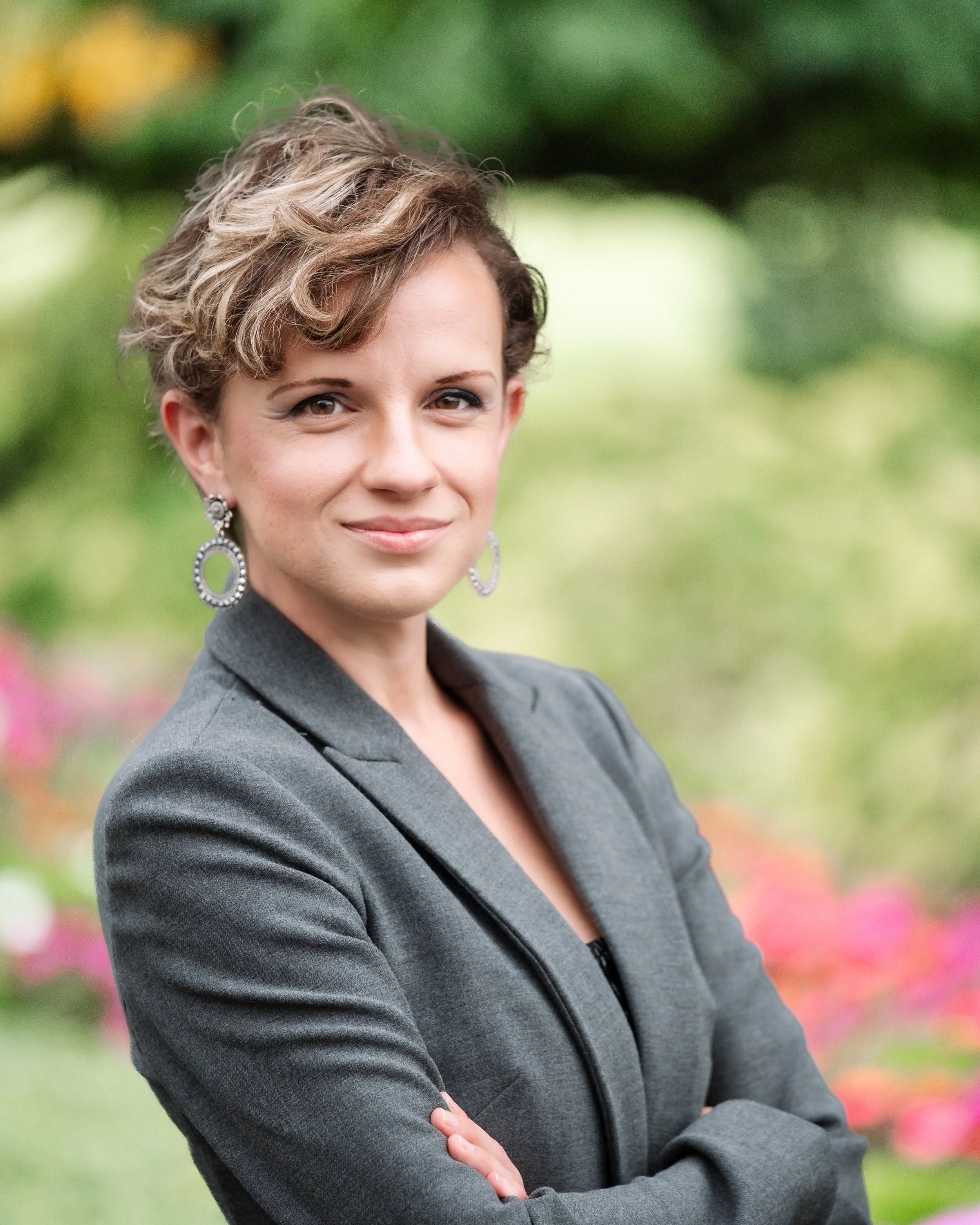 Reland Finch, LPC, Chief Clinical Officer at Healthy Minds Therapy, smiling in a professional portrait.