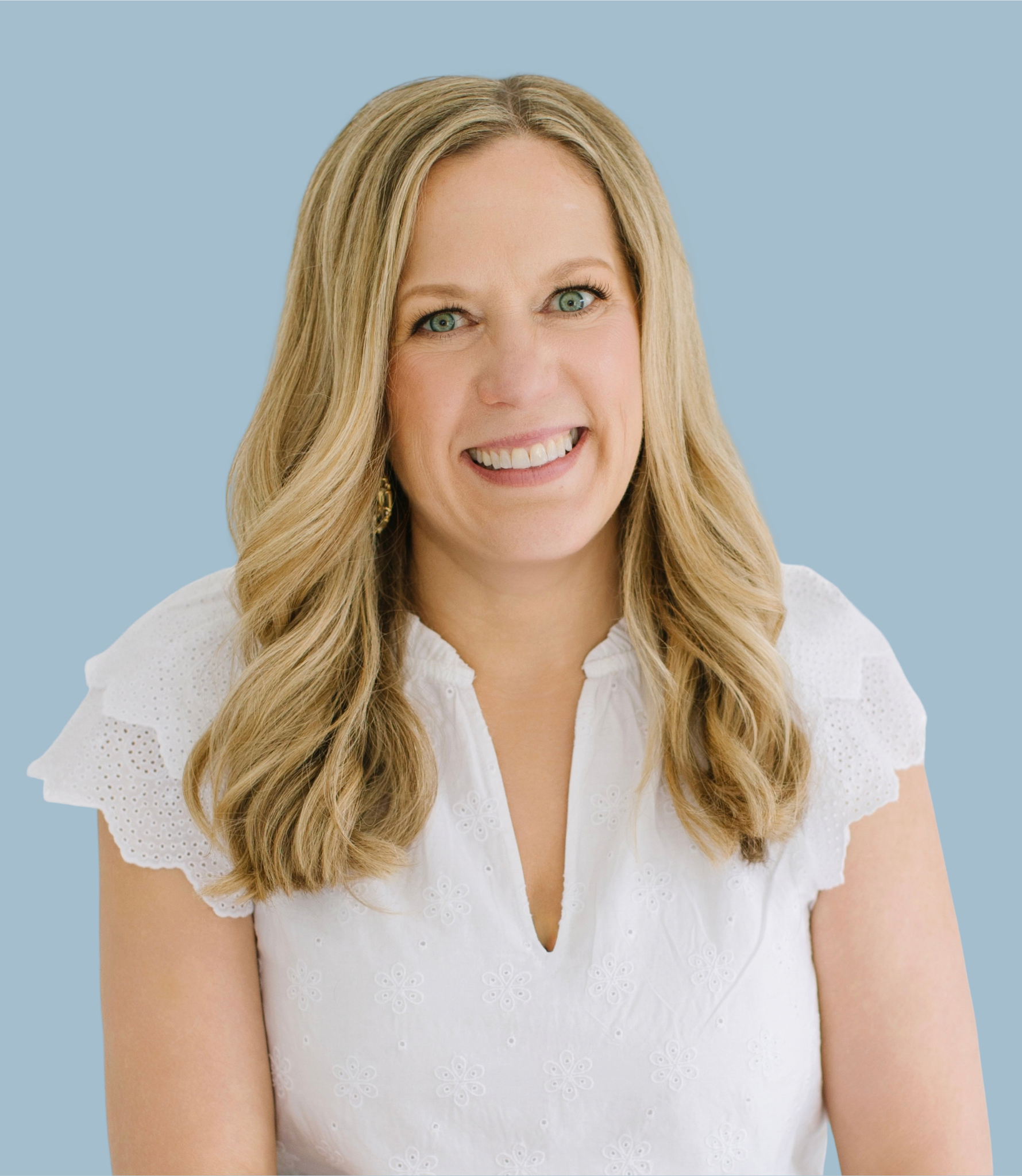 Debbie Feehery, Healthy Minds Therapy team member, smiling in a professional portrait.