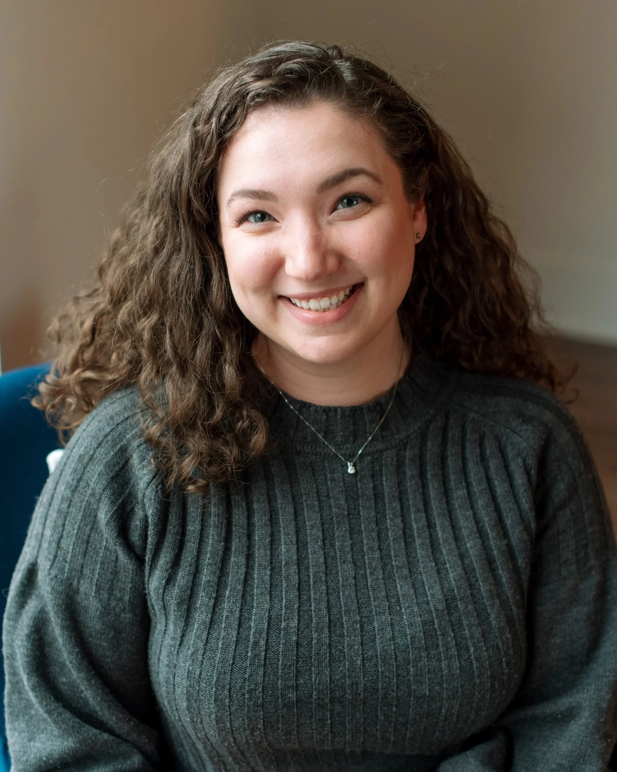 Kristen Ninosky, Managing Director at Healthy Minds Therapy, smiling in a professional portrait.