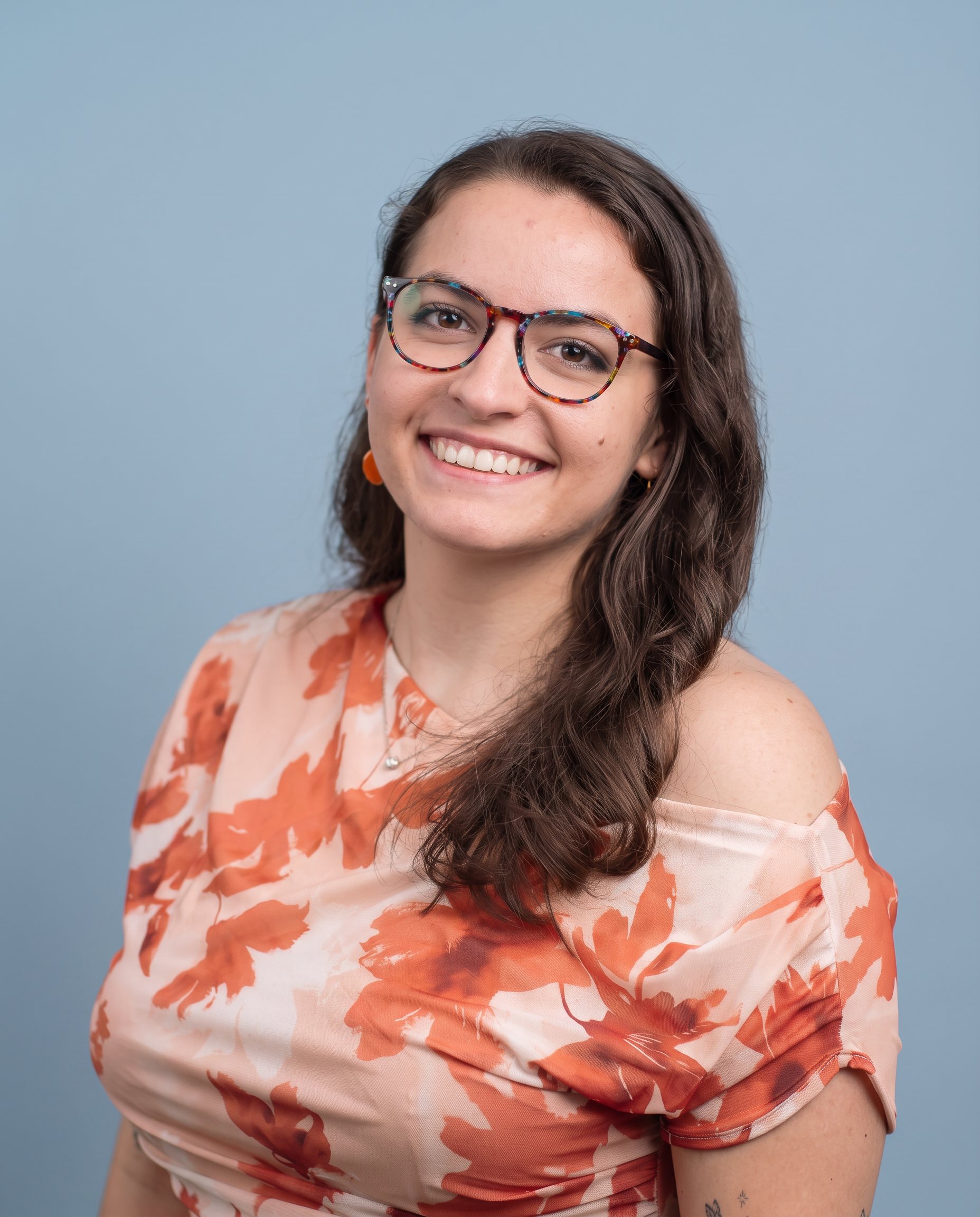 Erin Gallagher, Healthy Minds Therapy team member, smiling in a professional portrait.