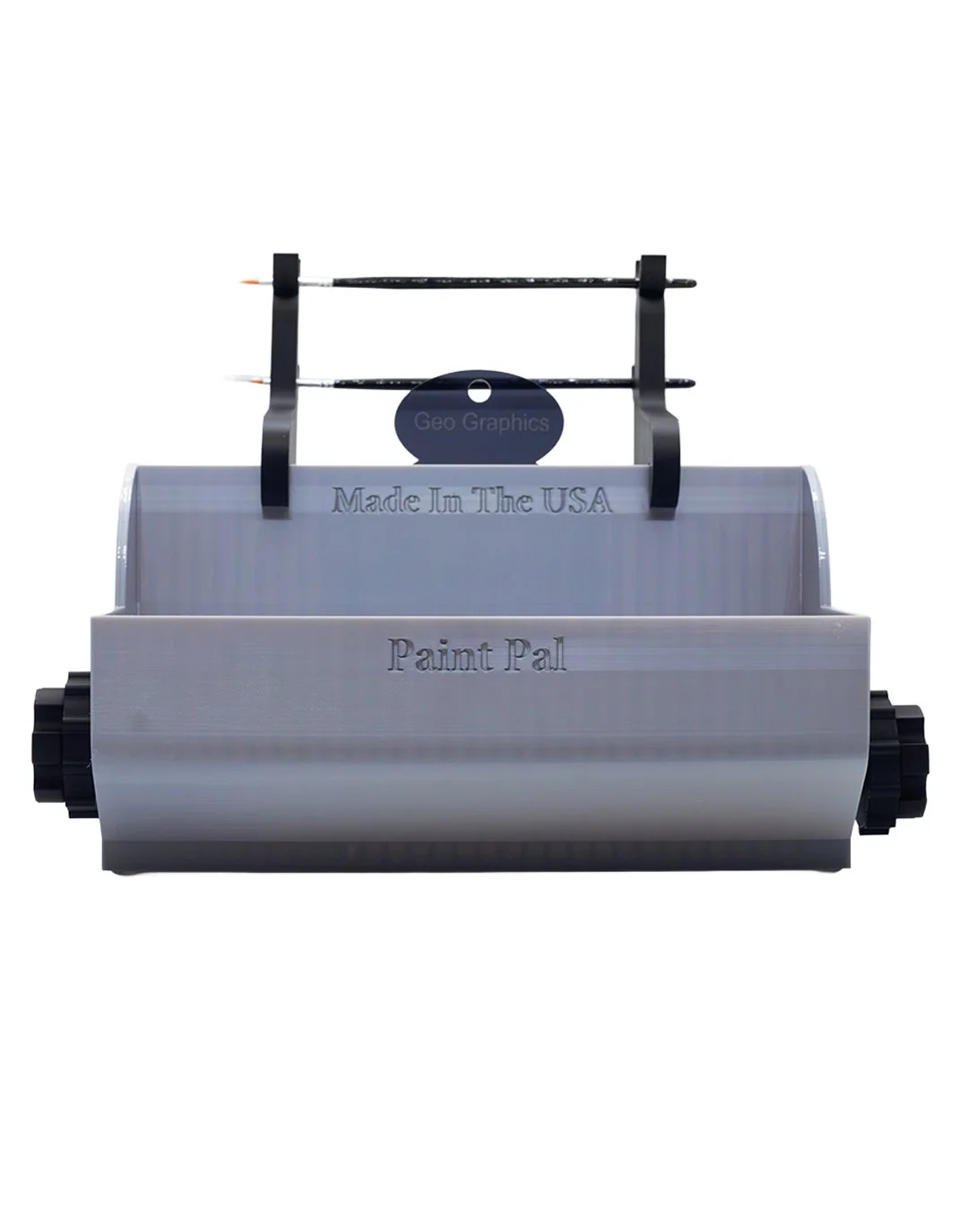 A small, handheld paint roller with a roller cover and a handle. The roller is labeled 'Paint Pal,' with inscriptions 'Made In The USA' and 'Geo Graphics' on the handle and roller. The background is plain white.