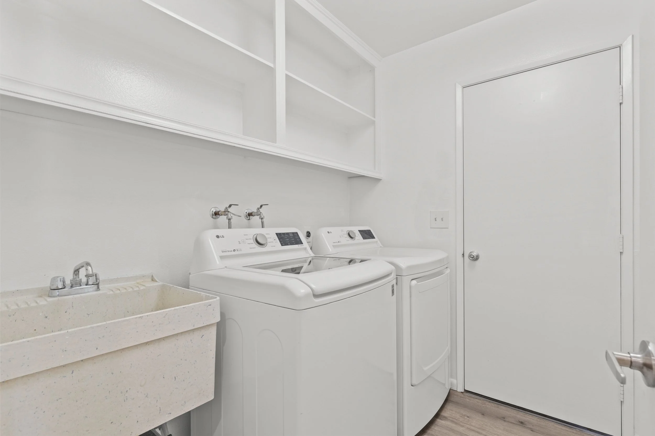spacious laundry room and wash sink