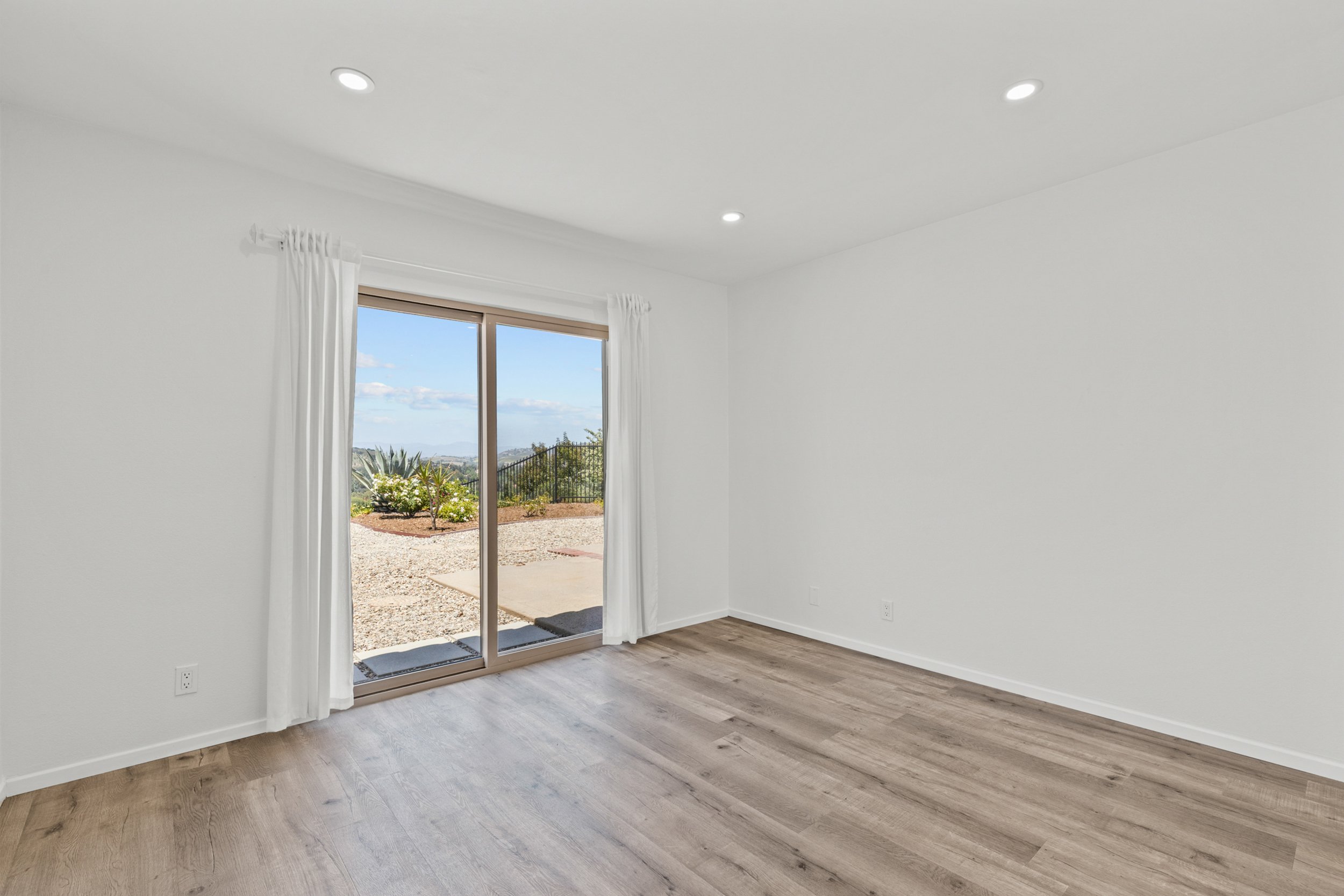 bedroom 1 (north facing with slider doors to backyard)