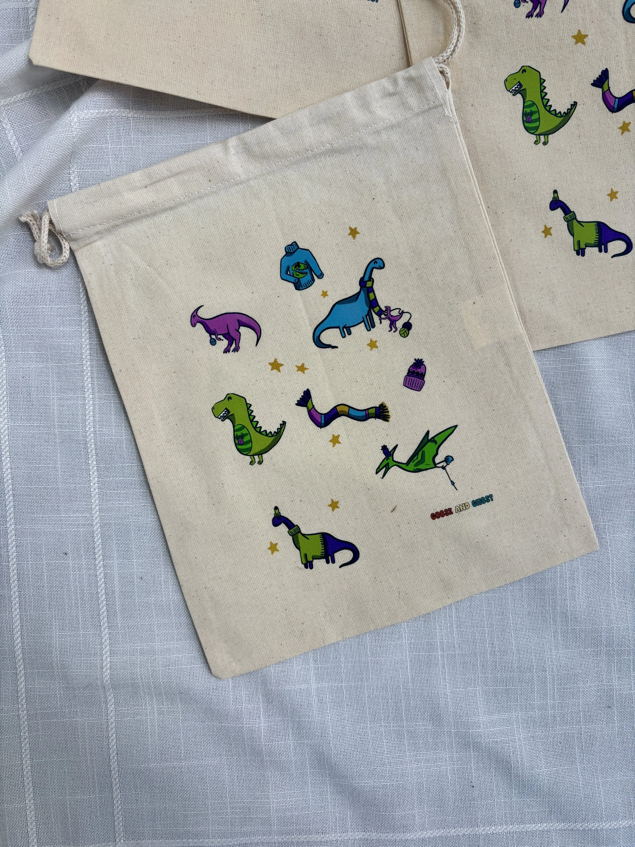 Fiber Arts Dinos Printed Drawstring Bag