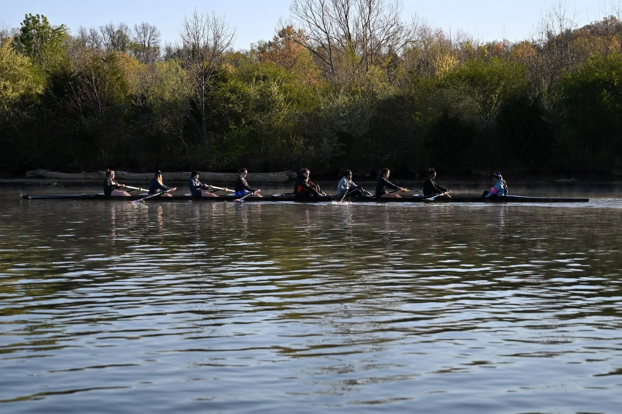 High school rowers during an early morning practice on Kent Lake in Milford, Michigan's Kensington Metropark.