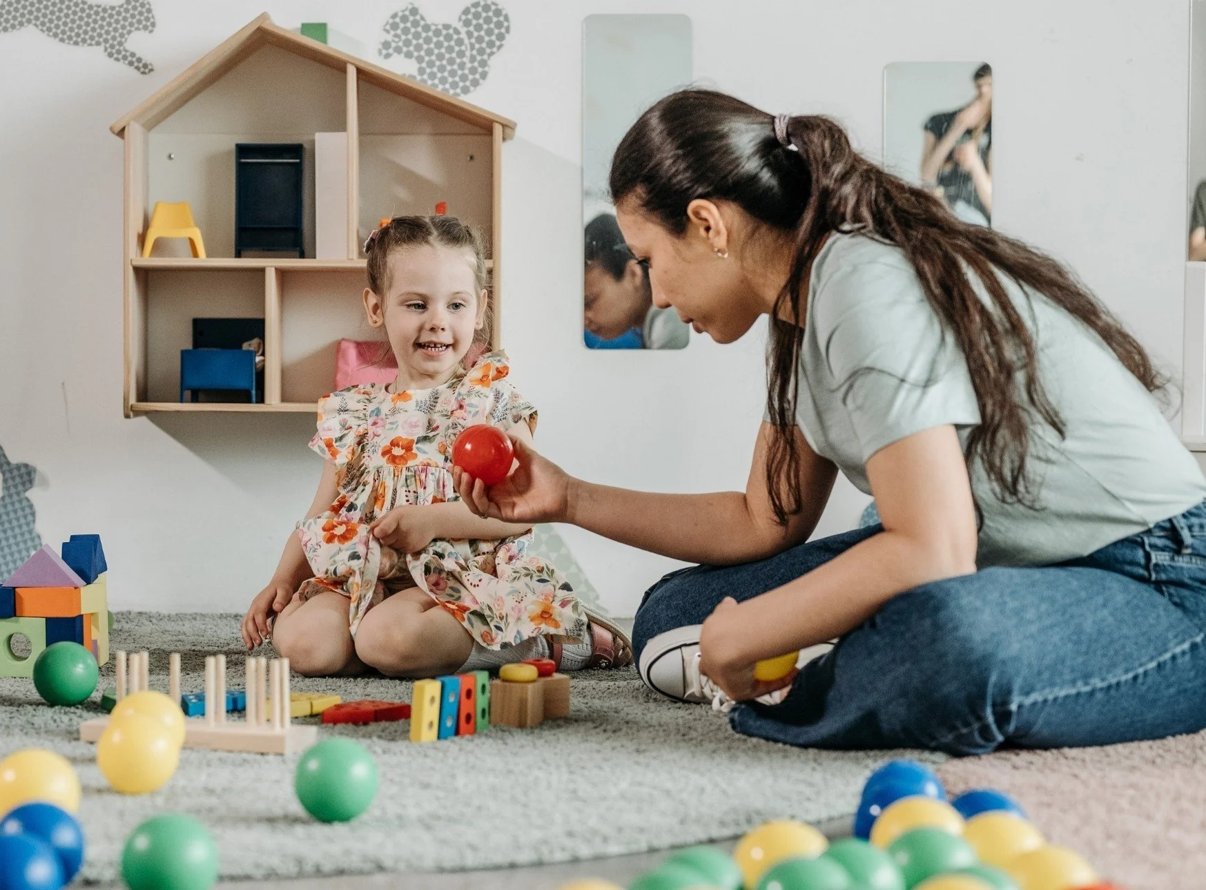 A clinician conducts an autism diagnostics evaluation with a young child, serving families in Thomasville, Davidson County, and Forsyth County, North Carolina.