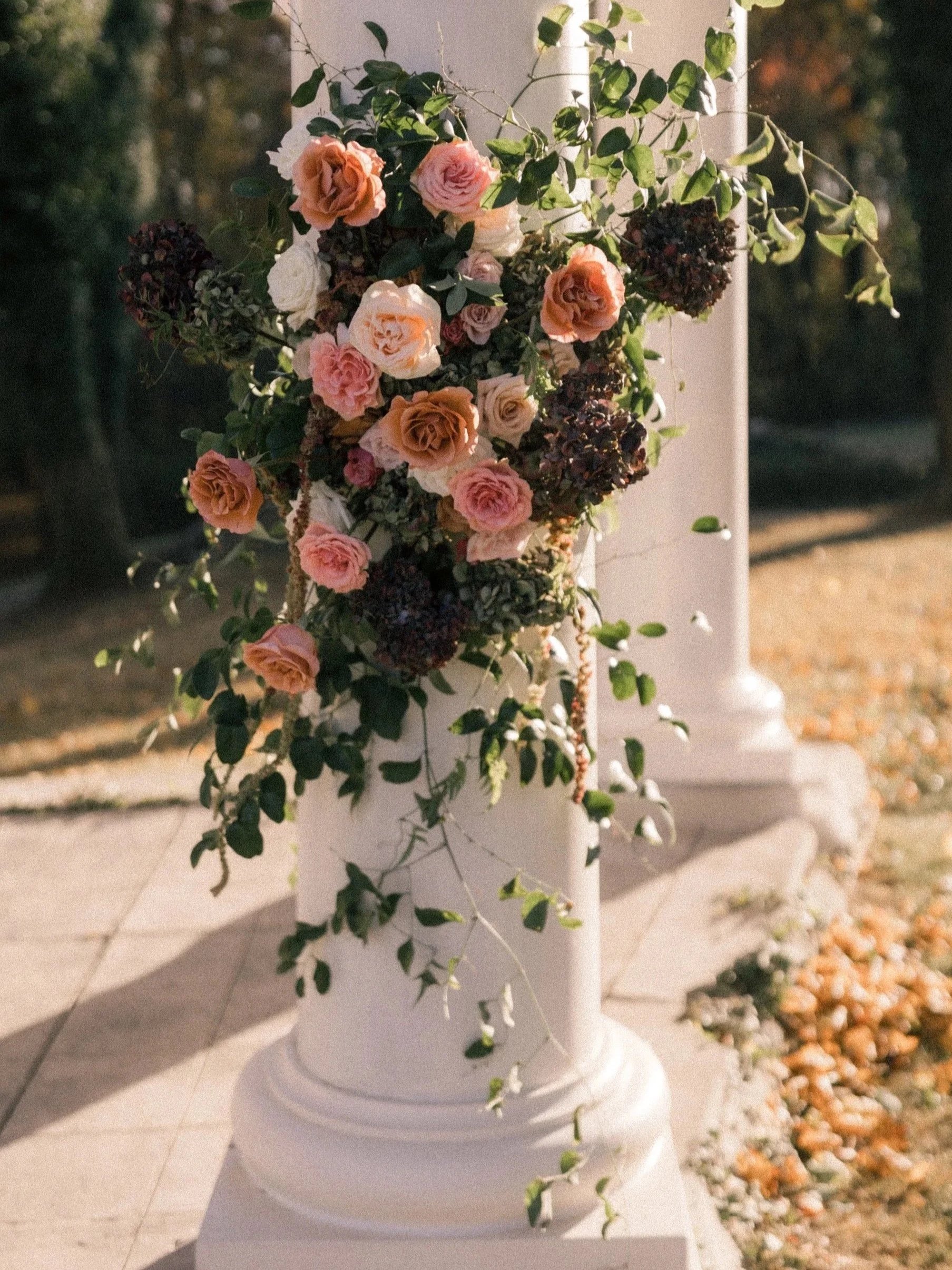 Wedding floral on pillar