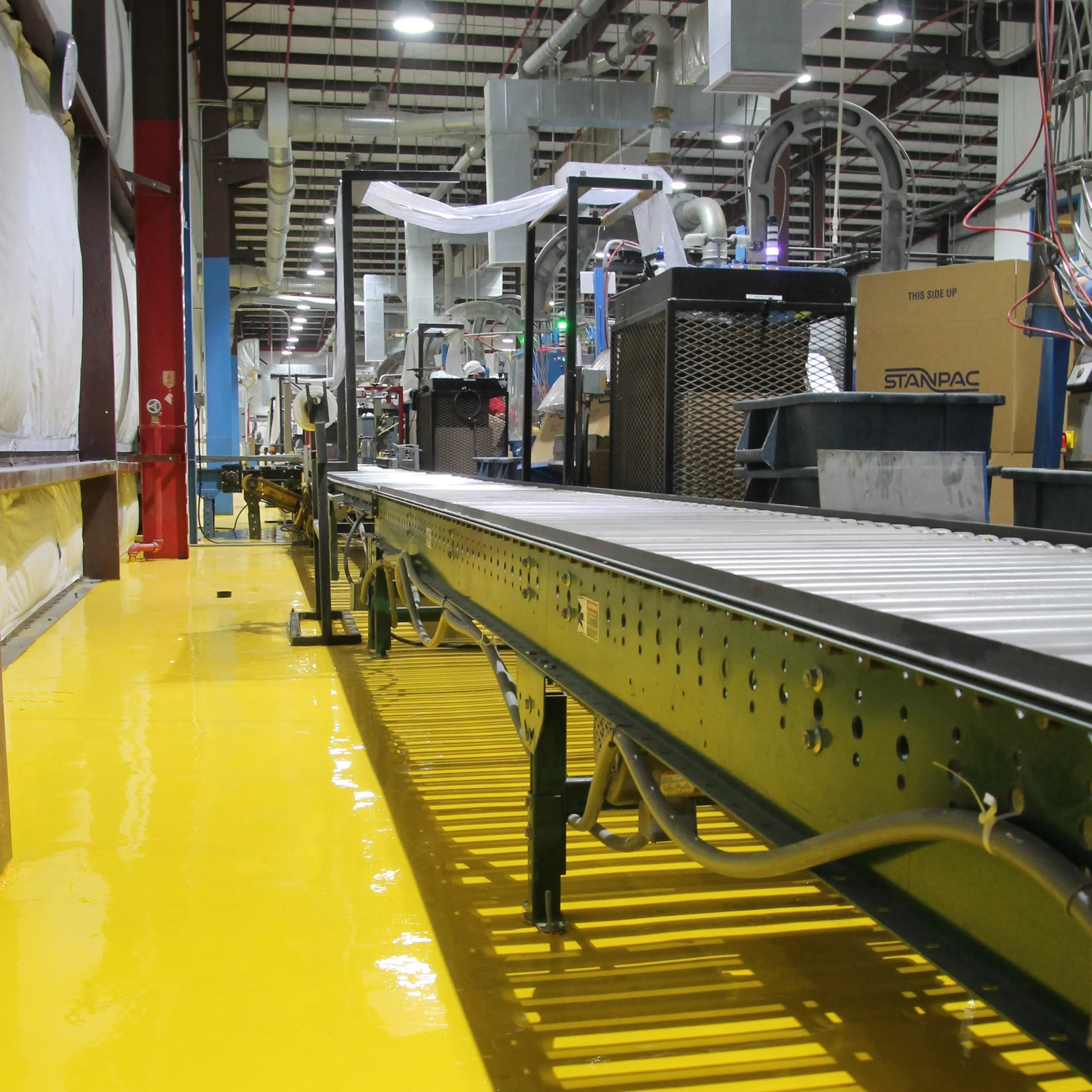 Transforming Stanpac's Facility with Polished Concrete: A Step Towards Durability and Aesthetics