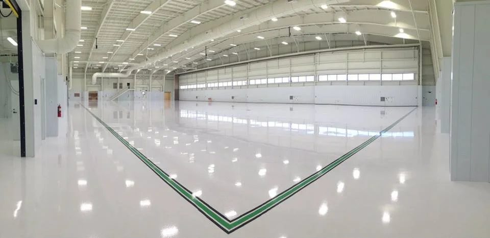 Custom Corporate Hangar in San Antonio, Texas with Tennant Company Floor Systems!