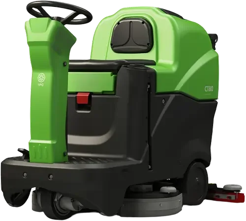 Green and black ride-on floor scrubber machine.