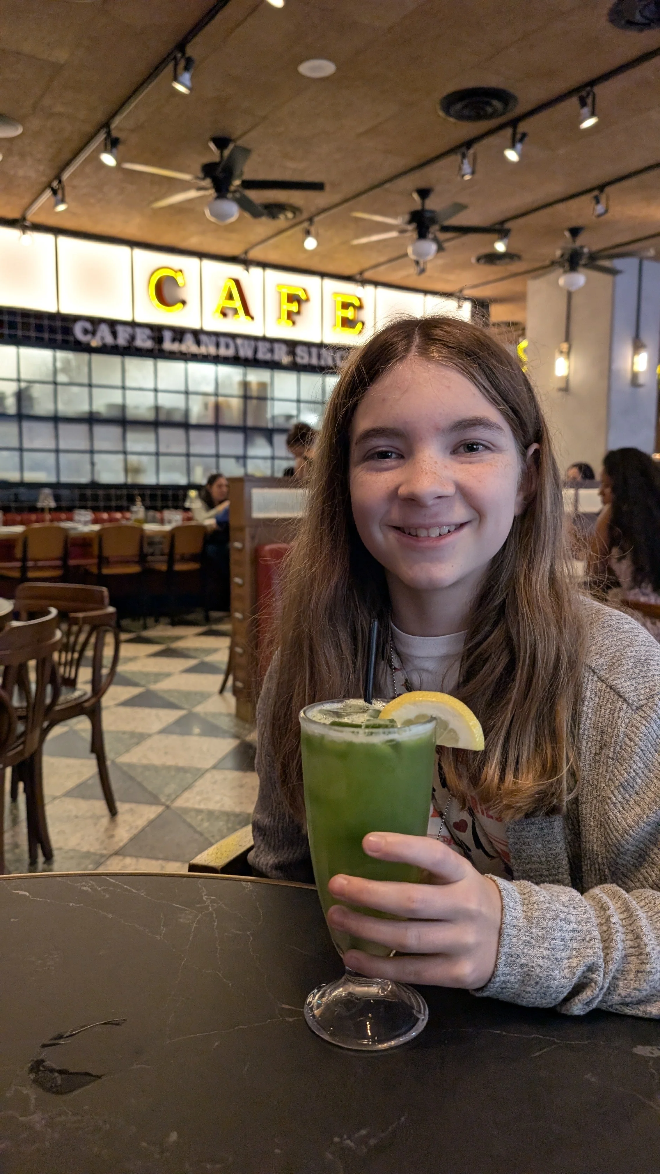 Me with cucumber lemonade at Cafe Landwer!