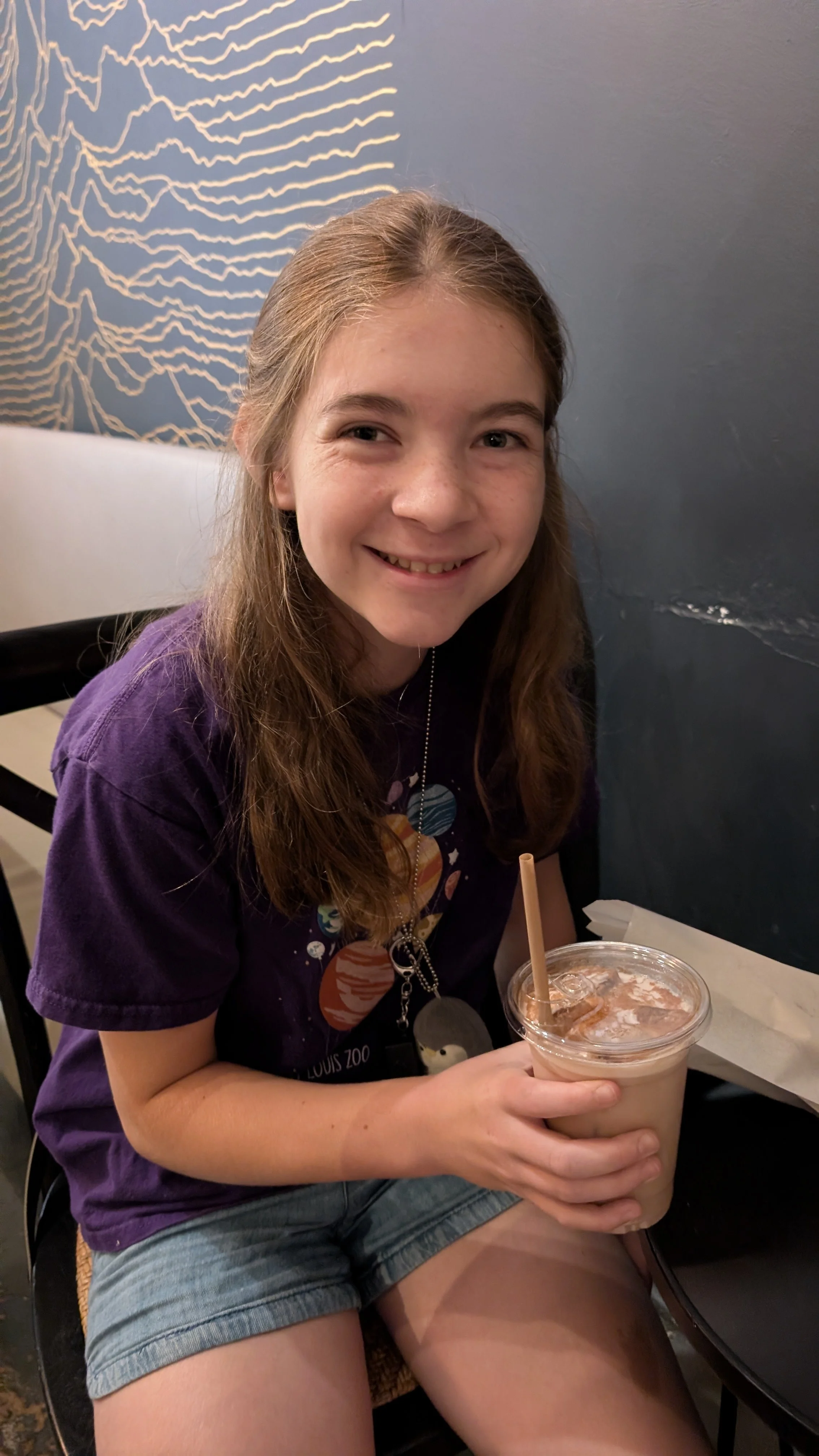 Me with a Cafe 23 Chai Latte